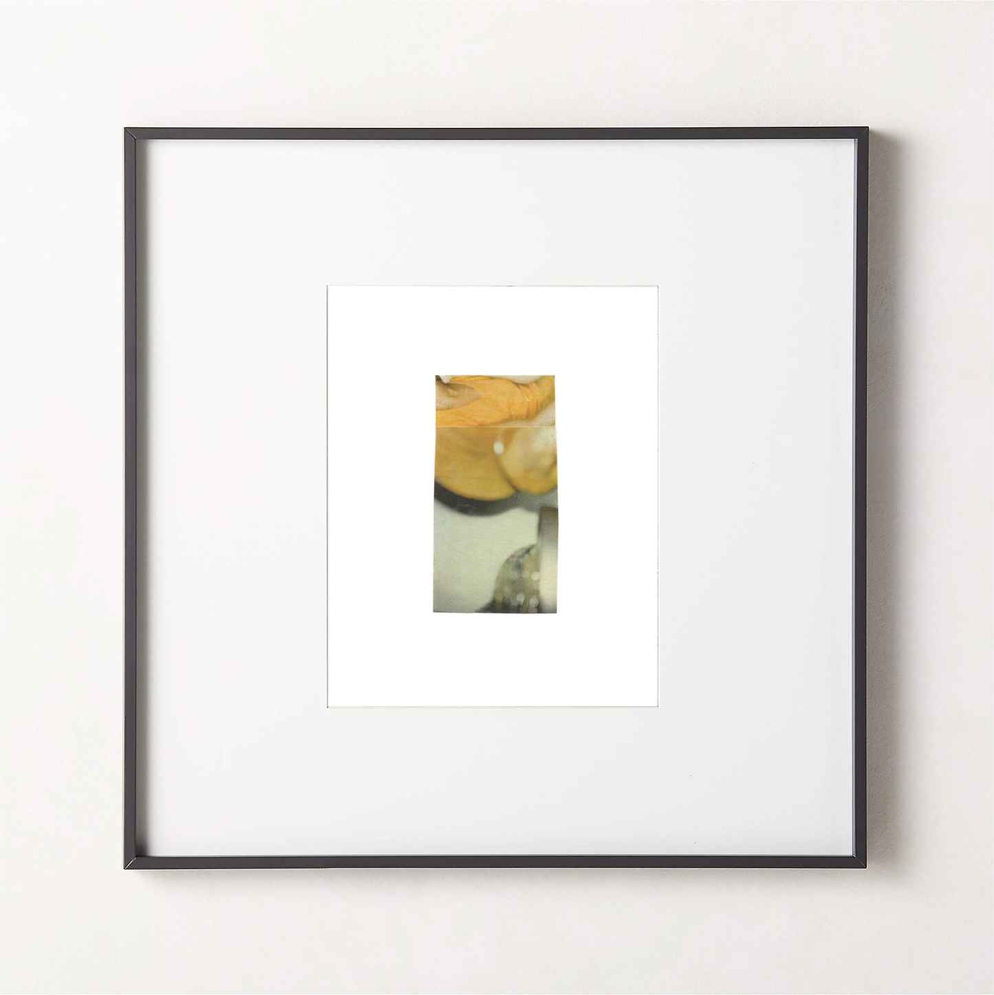Abstract photo collage artwork with warm golden-yellow tones and soft grayish green and white elements in a black frame.