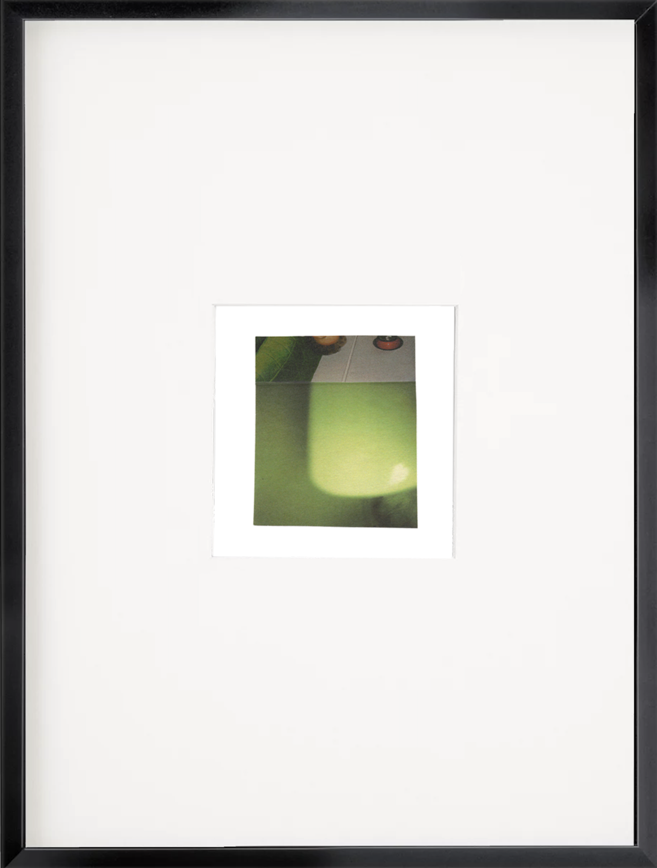 Framed abstract photo collage featuring figurative elements with luminous green-yellow atmospheric tones and soft gradients.