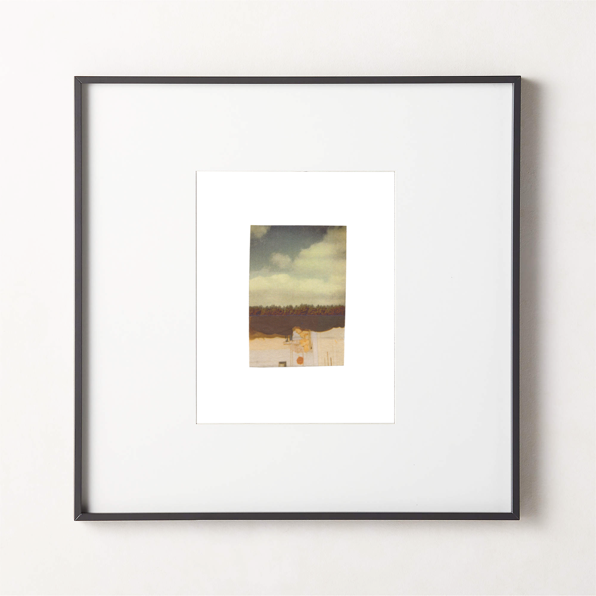 Abstract photo collage artwork featuring a landscape in warm ochre and cream tones in a black frame.