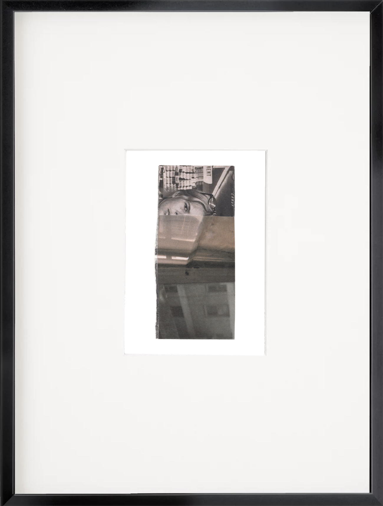 Abstract photo collage featuring a female figure in black and white with layered elements and soft grayscale tones in a black frame.