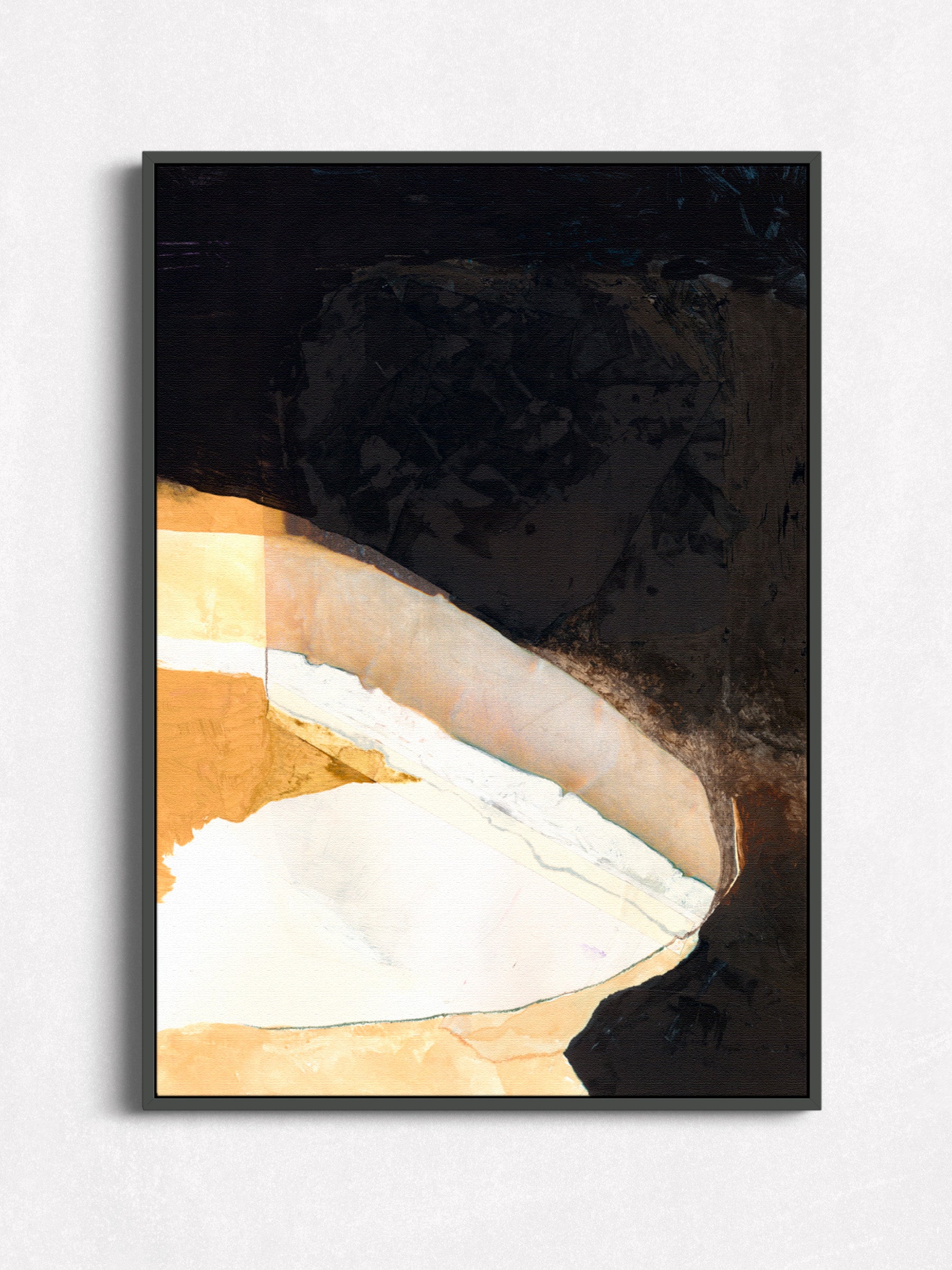 Abstract painting with black, white, and gold colors in a black floater frame.