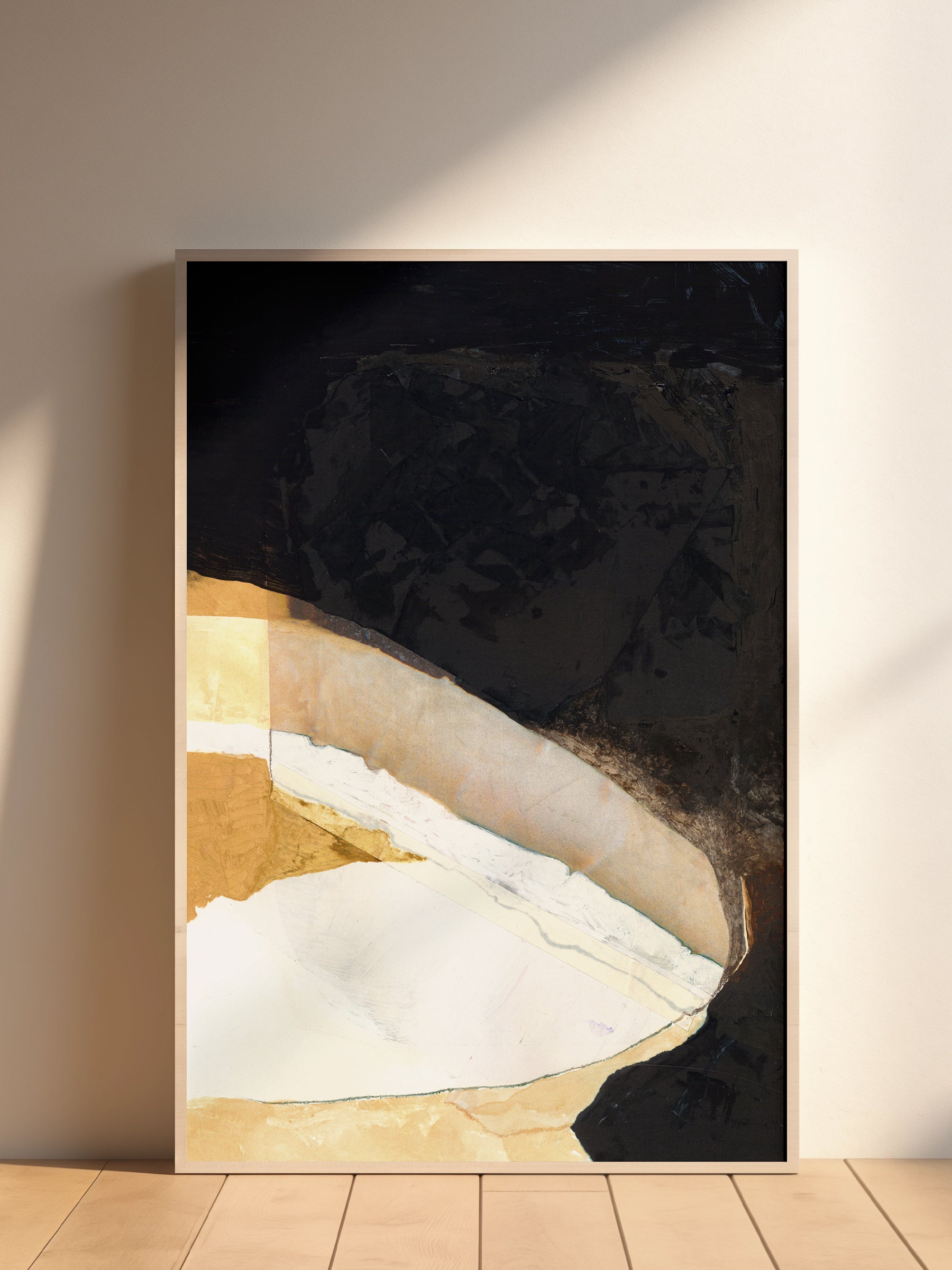 Abstract art piece with black, white, and brown colors in a frame.