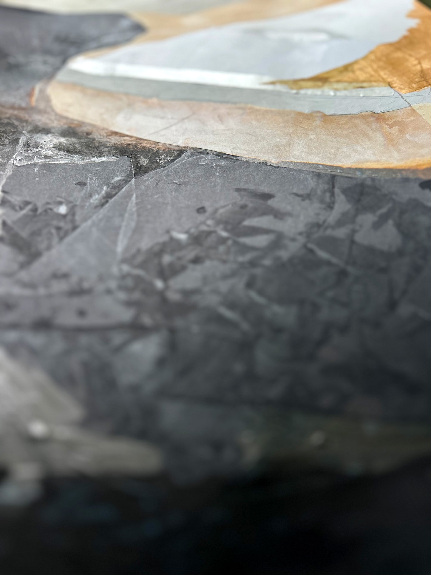 Close-up of a textured surface with of an abstract painting.