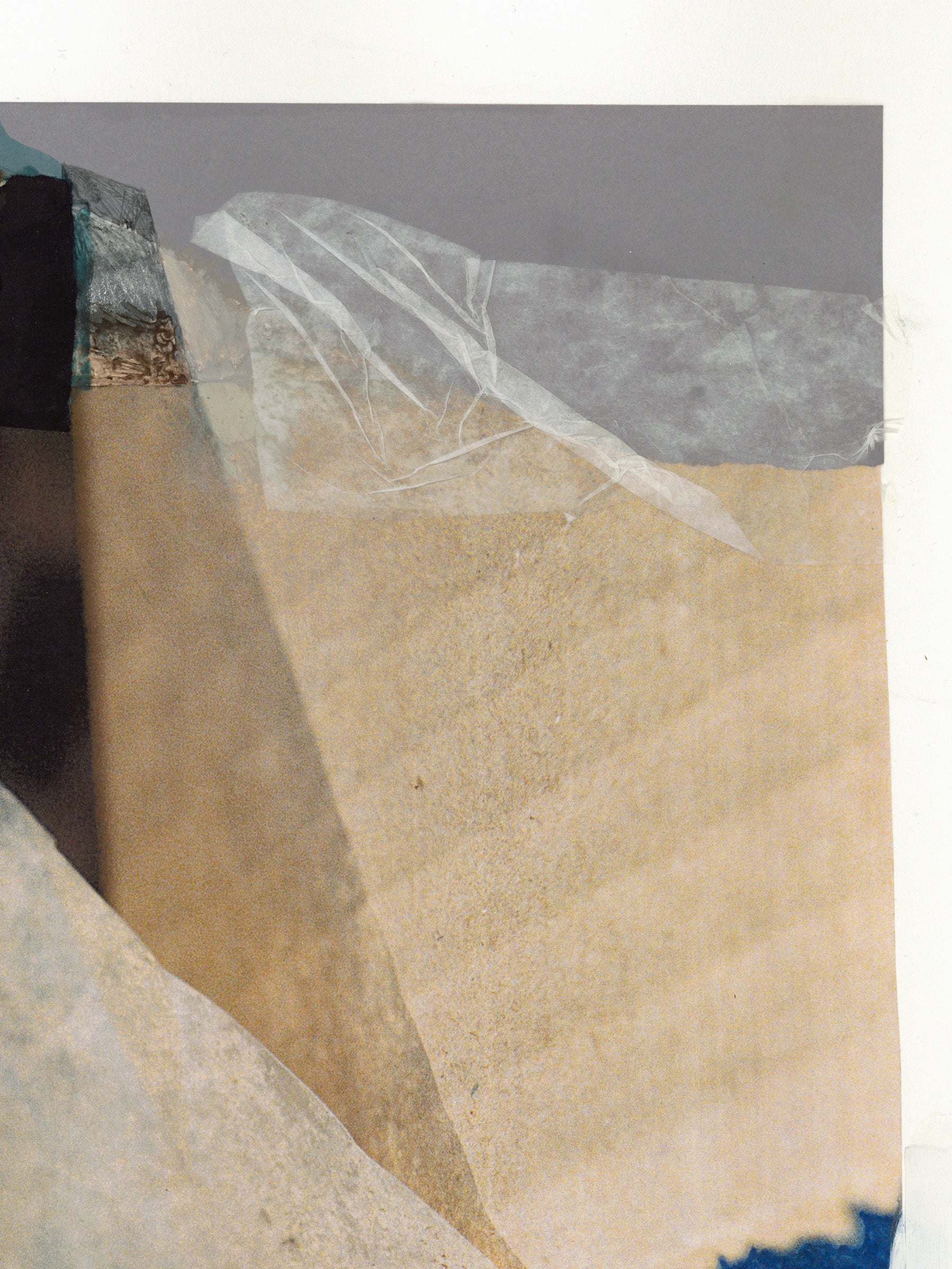 Close-up of a textured painting with black, beige, and gray colors and white tissue paper.