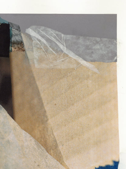 Close-up of a textured painting with black, beige, and gray colors and white tissue paper.