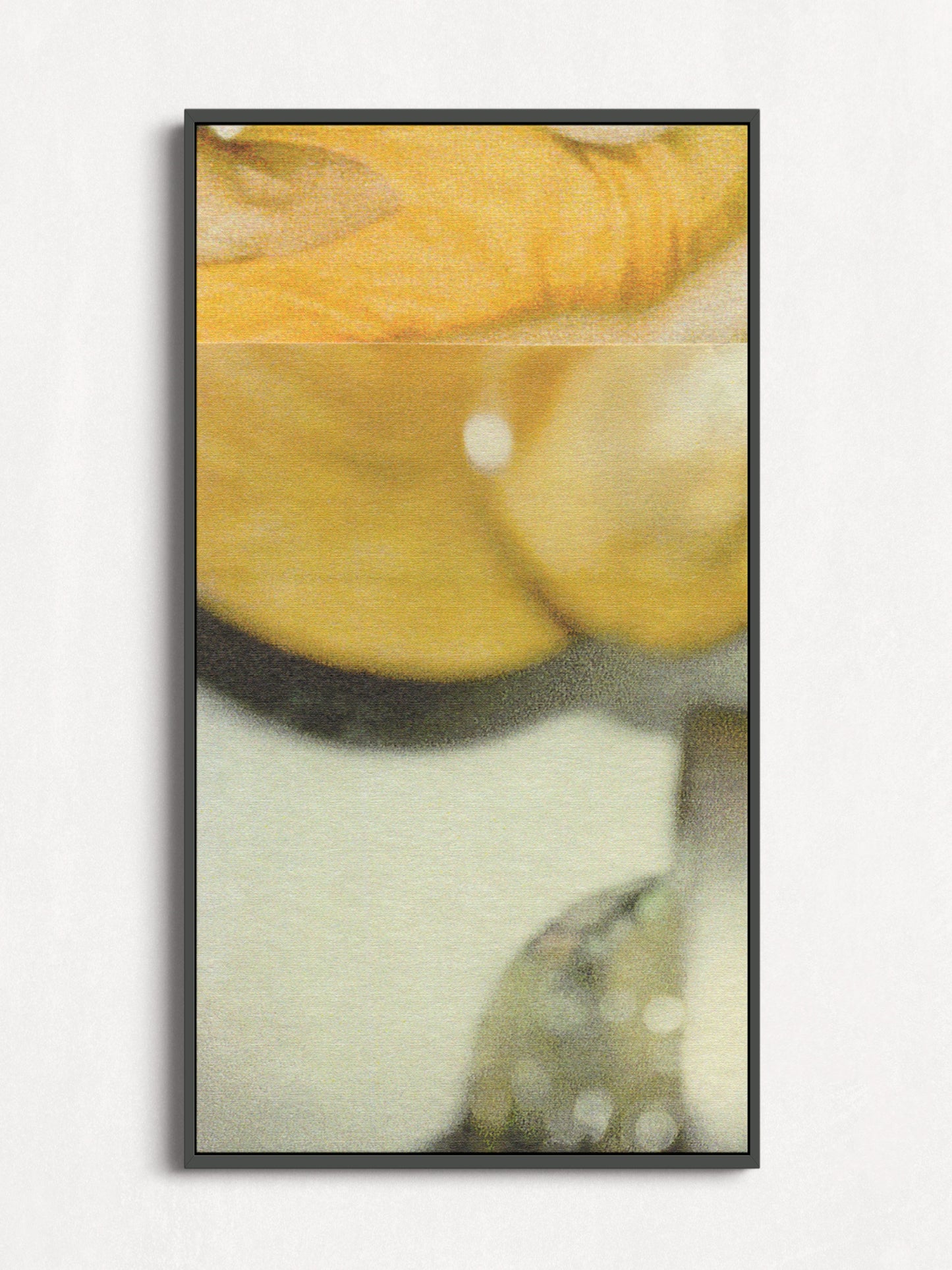 Framed yellow, gold, and sage green abstract photo collage in a black frame.