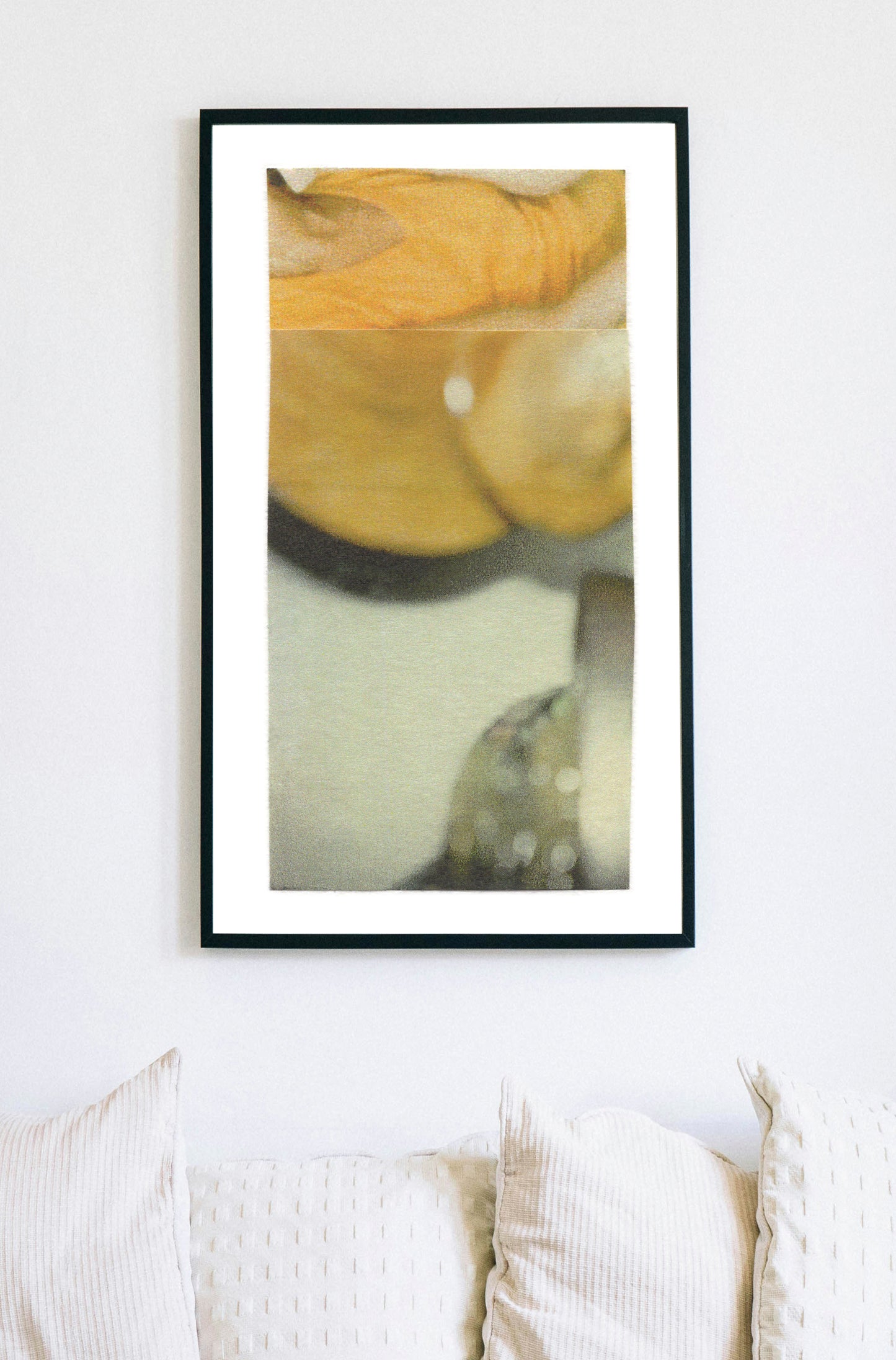 Yellow, gold, and sage green abstract photo collage in a black frame.