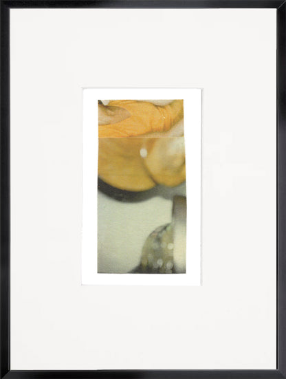 Abstract photo collage artwork with warm golden-yellow tones and soft grayish green and white elements in a black frame.