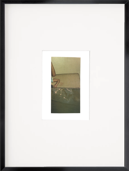 Abstract photo collage featuring a figure by a pool with deep olive-green and soft cream architectural elements in a black frame