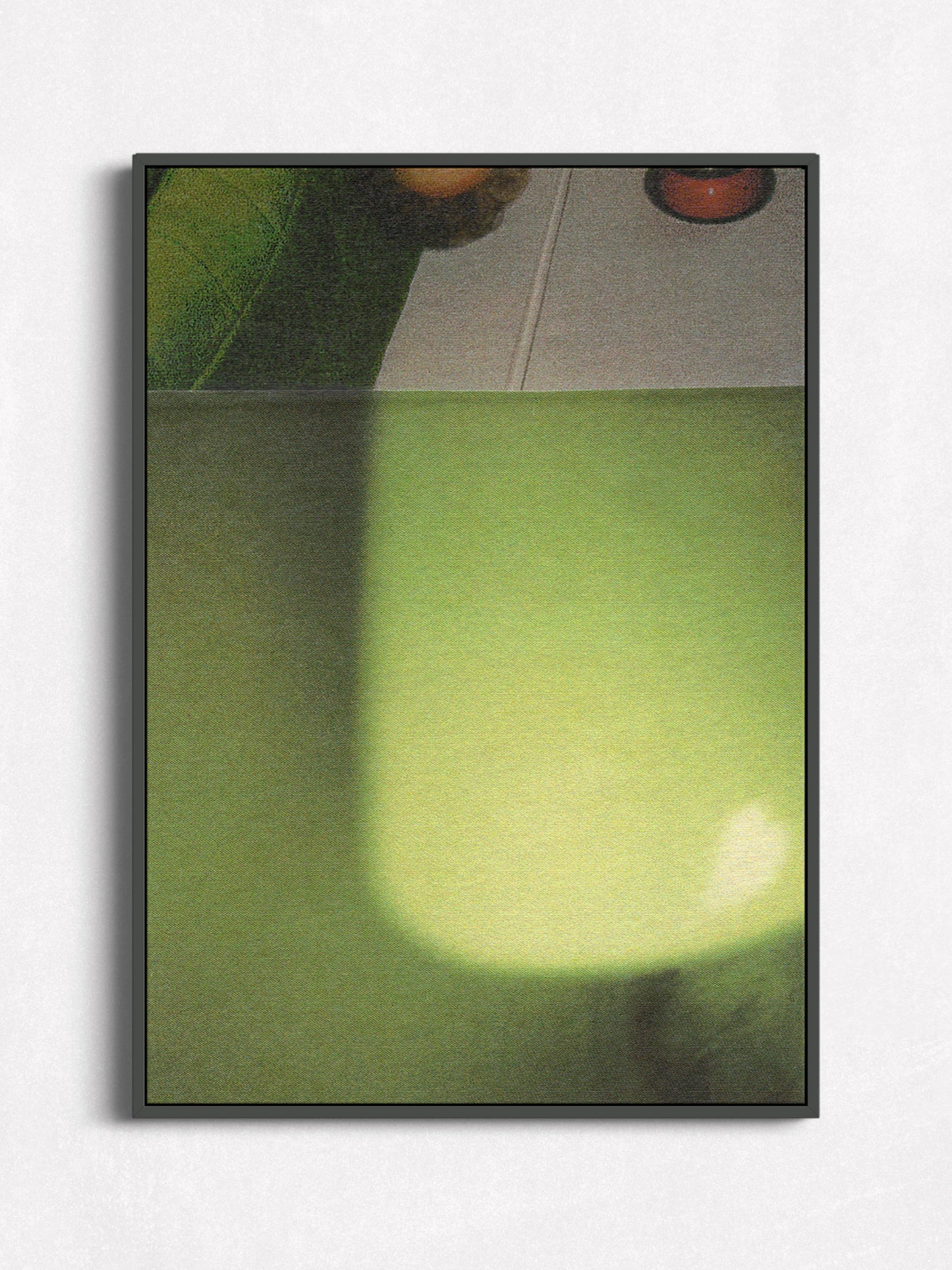 Canvas print of green and gray abstract mixed media photo collage art in a black floater frame.