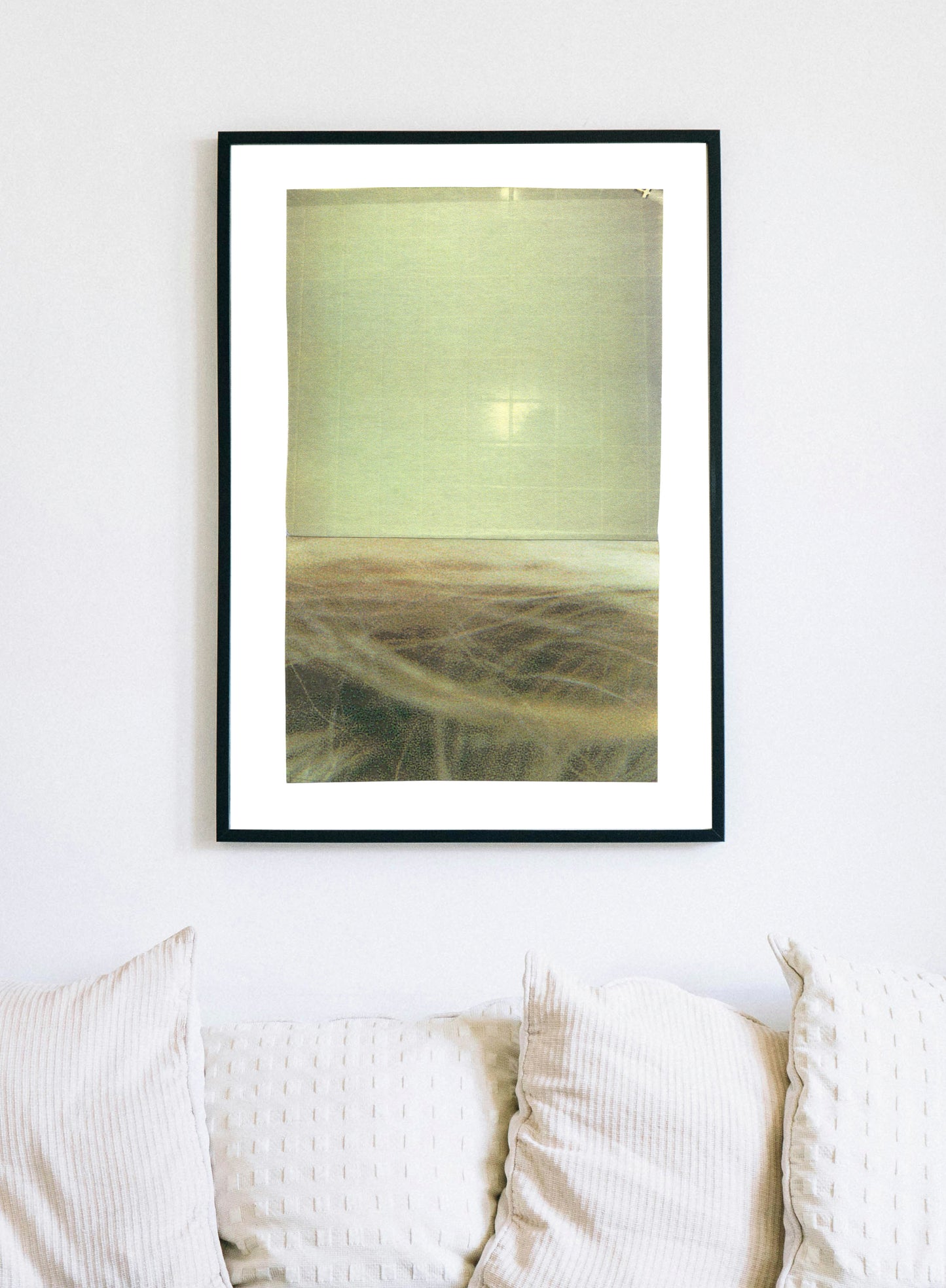 Yellowish green abstract photographic collage art with textures in a black frame.