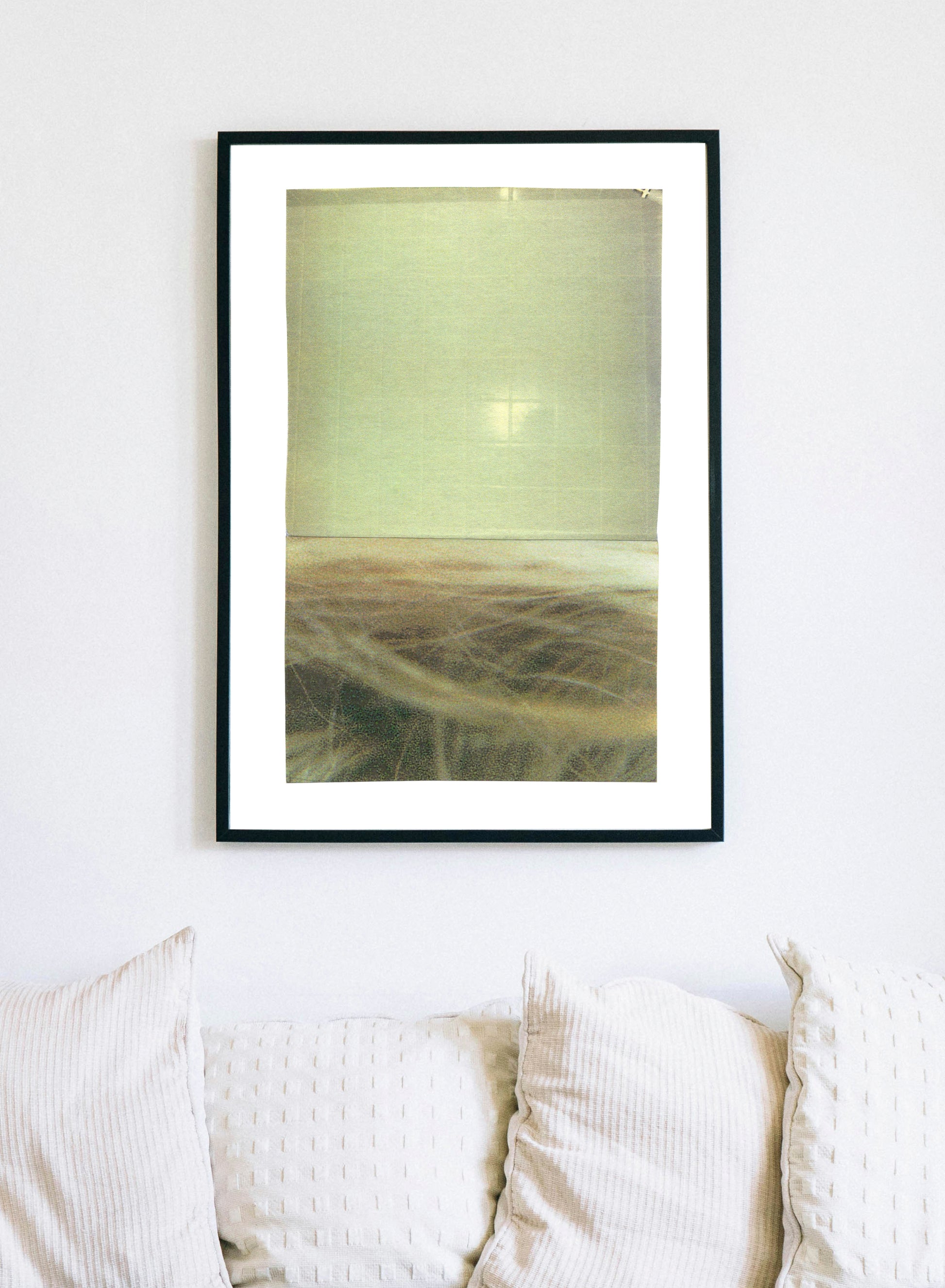 Yellowish green abstract photographic collage art with textures in a black frame.