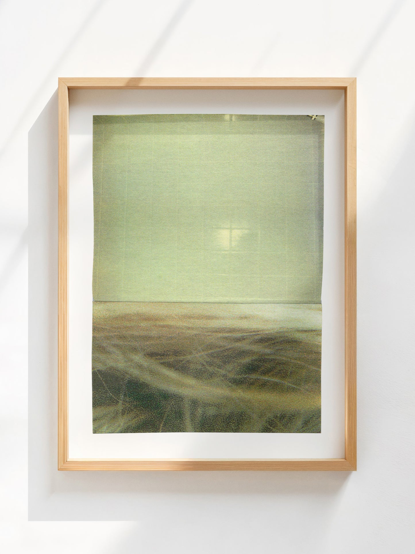 Yellow green abstract photographic collage art with textures in an oak frame.