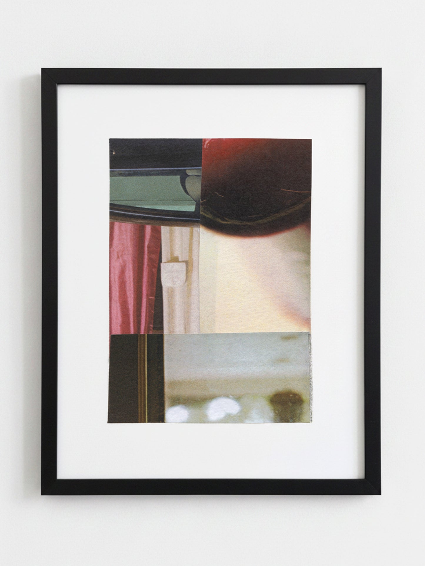 A framed abstract art print featuring a collage of textures and colors, including a pink curtain, a dark red shape, and a beige background, enclosed in a black frame with a white mat.