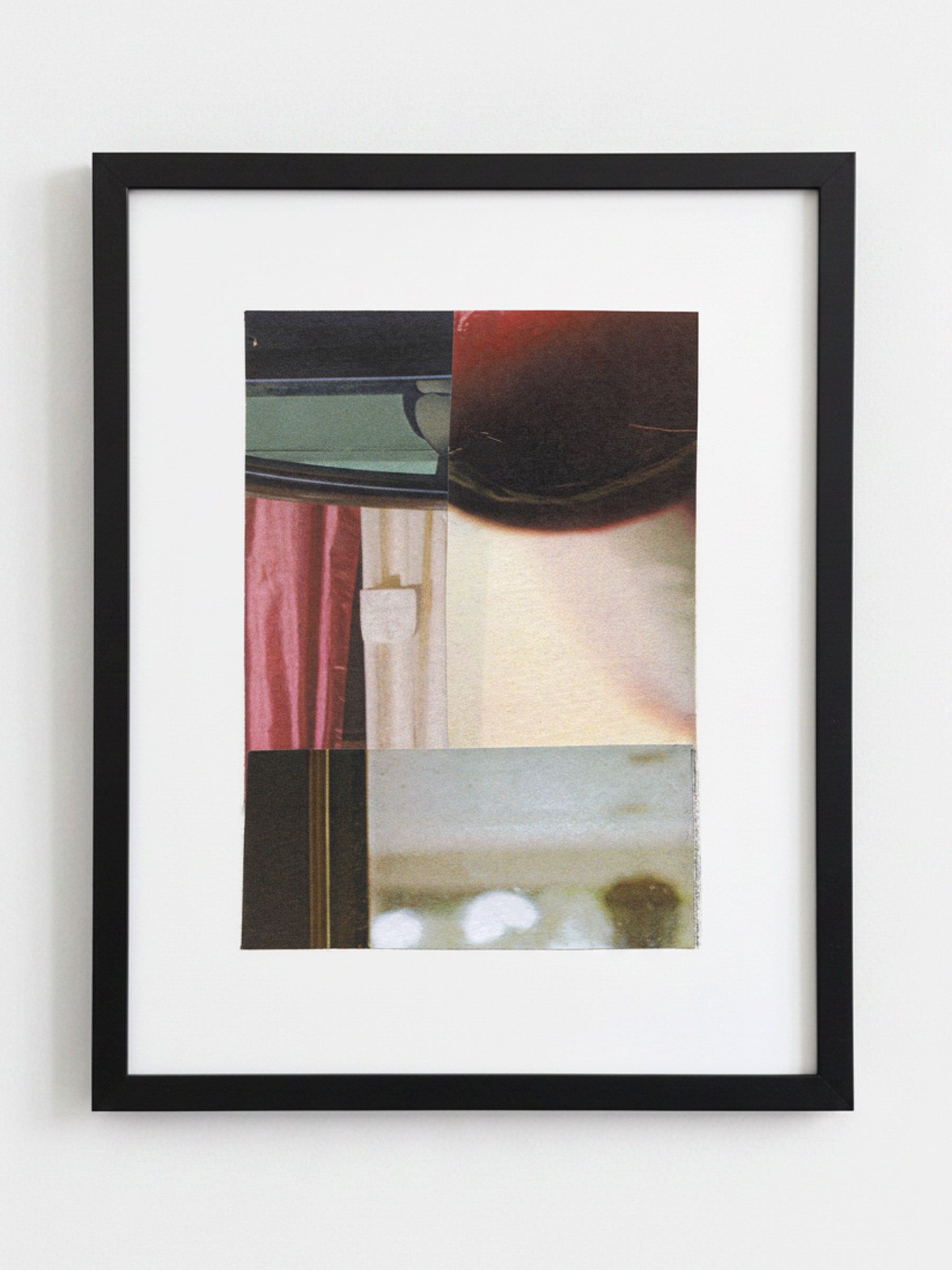 A framed abstract art print featuring a collage of textures and colors, including a pink curtain, a dark red shape, and a beige background, enclosed in a black frame with a white mat.