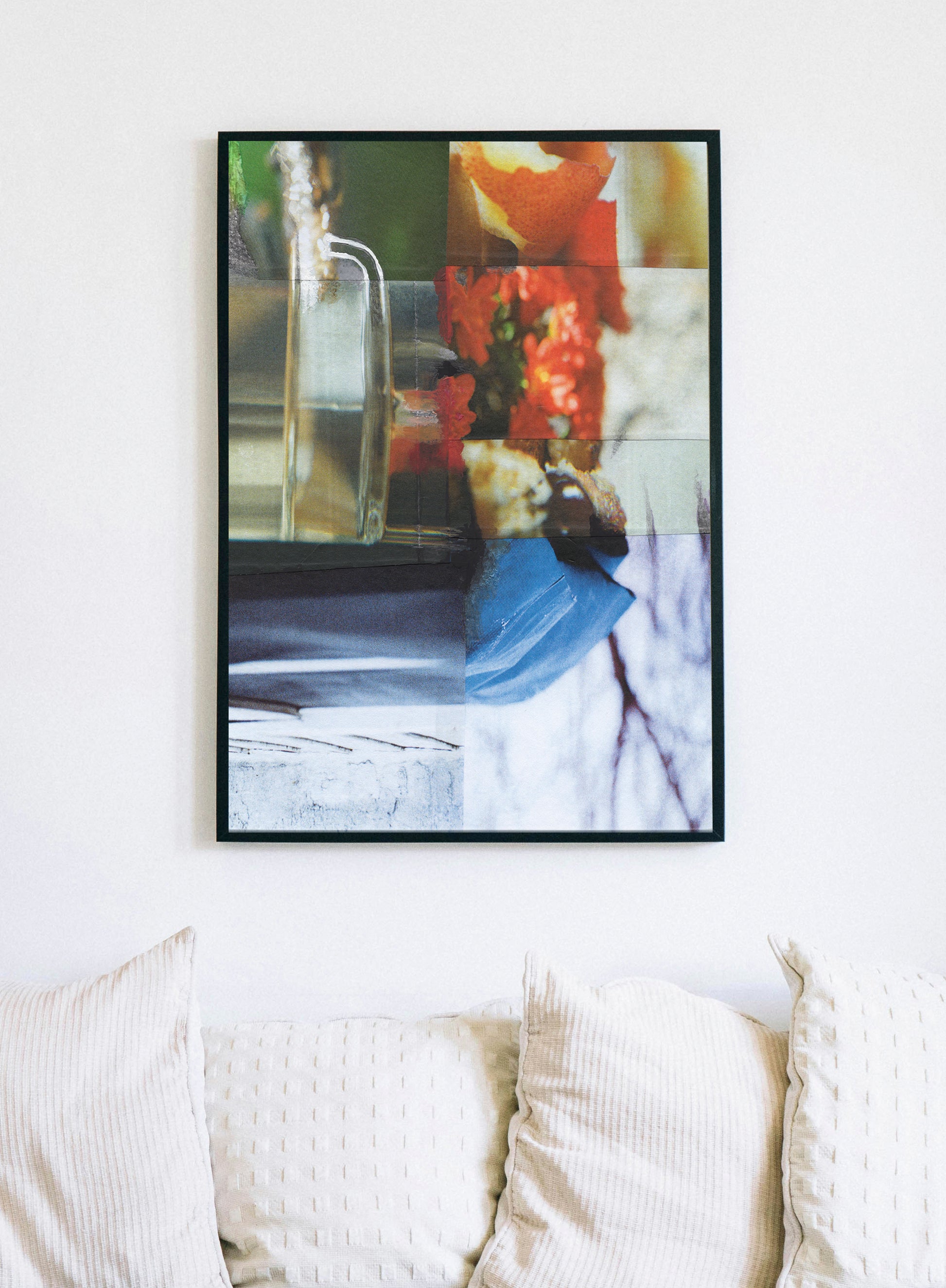 Framed canvas print of colorful abstract collage with glass, flowers, and abstract patterns.