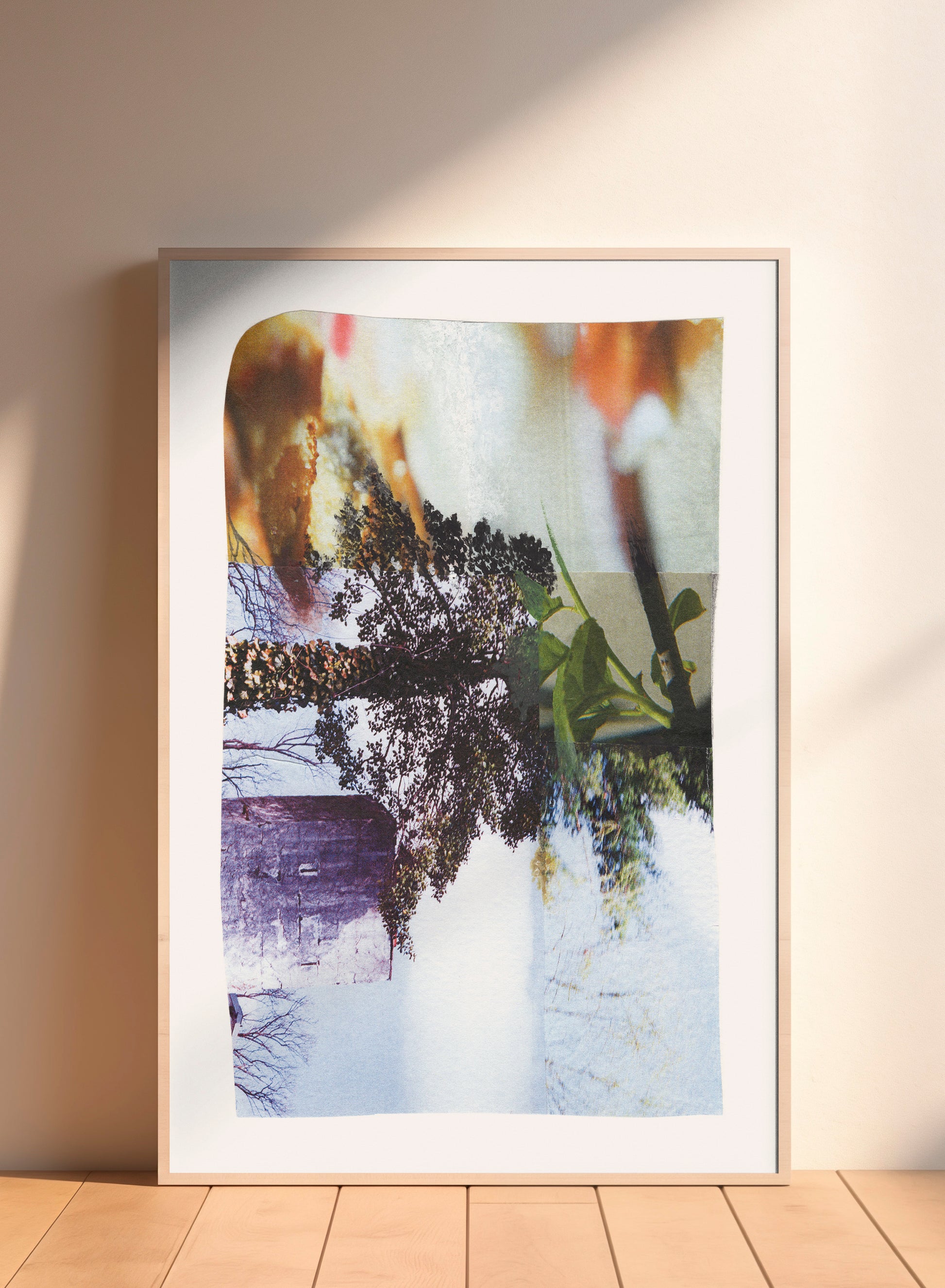 Framed print of an abstract mixed media collage with multi-color nature imagery.