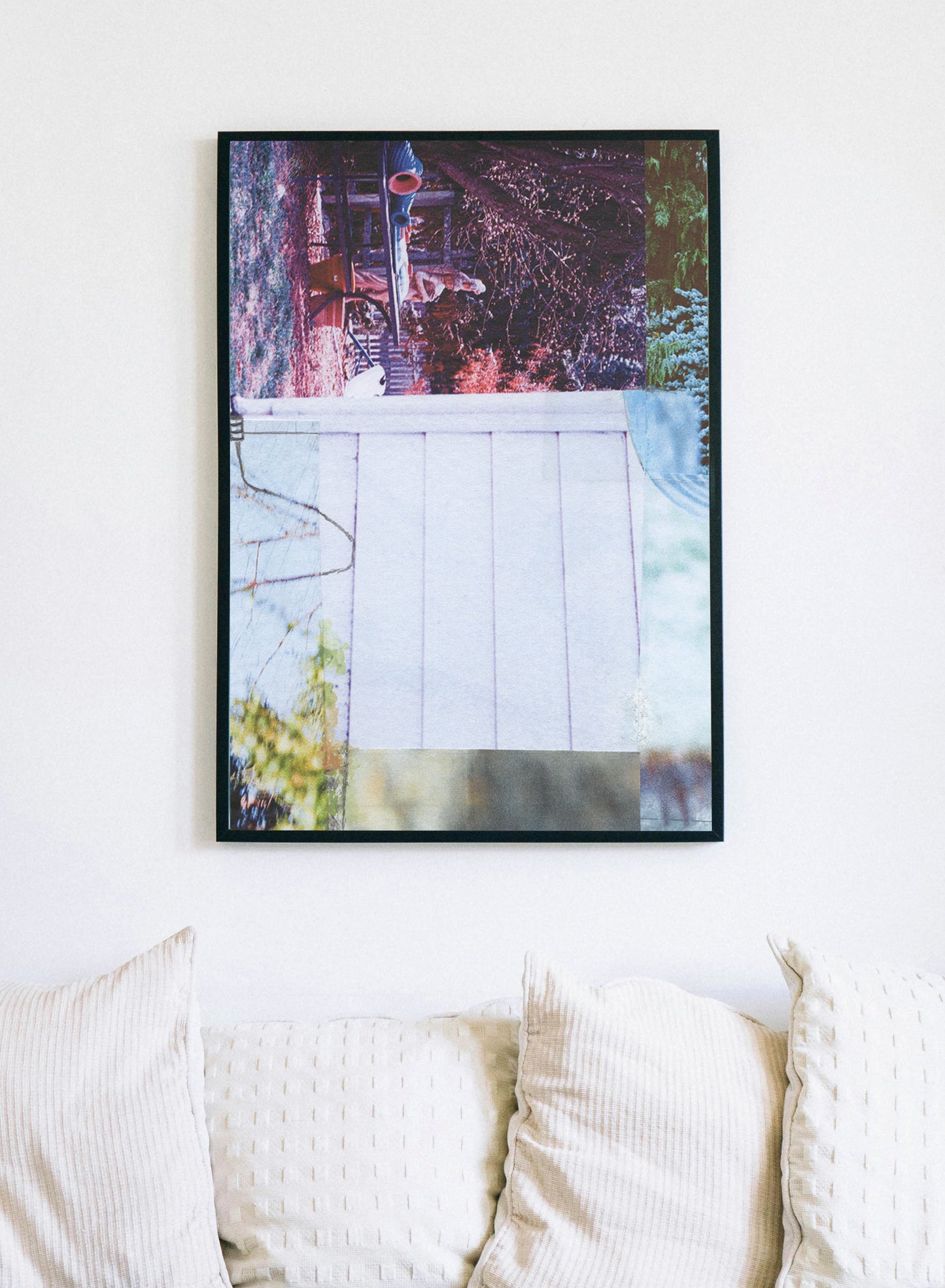 Framed canvas print of abstract collage with pink, purple, white, and green tones.