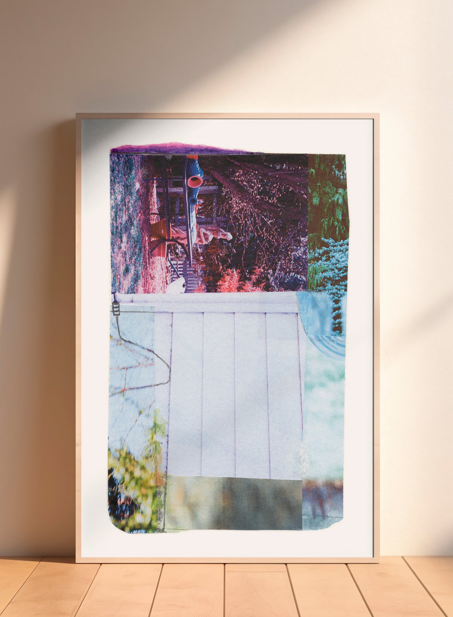 Framed print of abstract collage with pink, purple, white, and green tones.