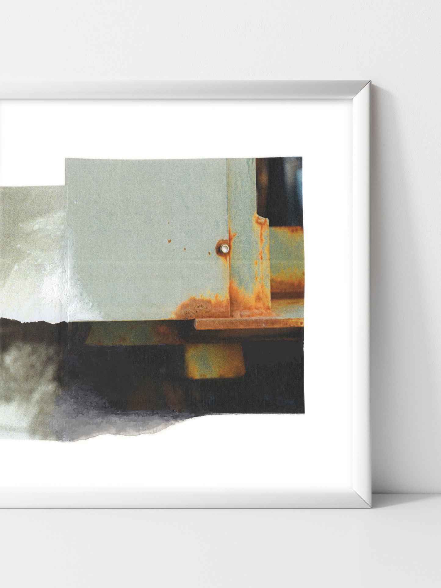 Abstract mixed media collage with neutral and amber tones in a white frame.