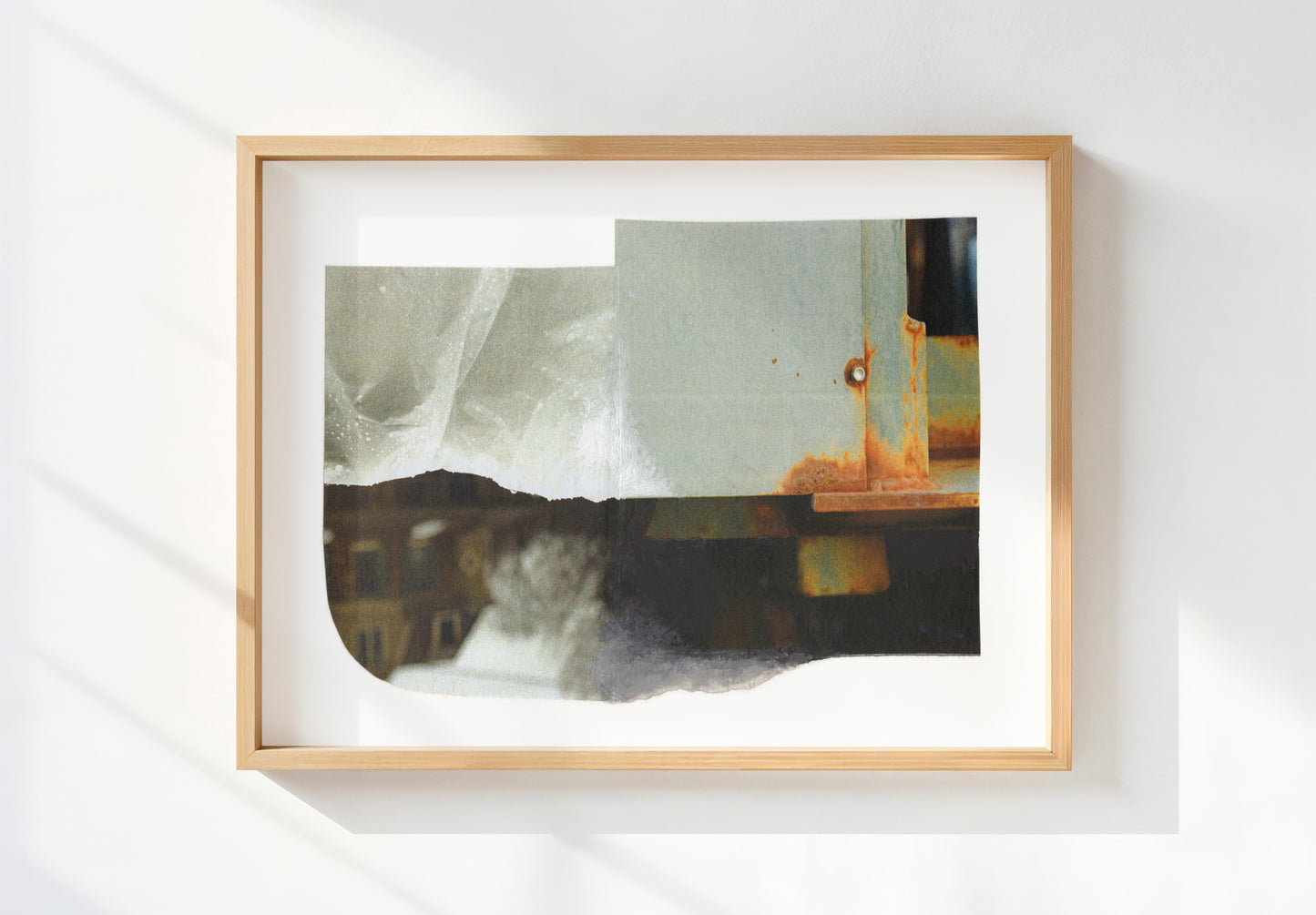 Framed paper print of abstract mixed media collage with neutral and amber tones.