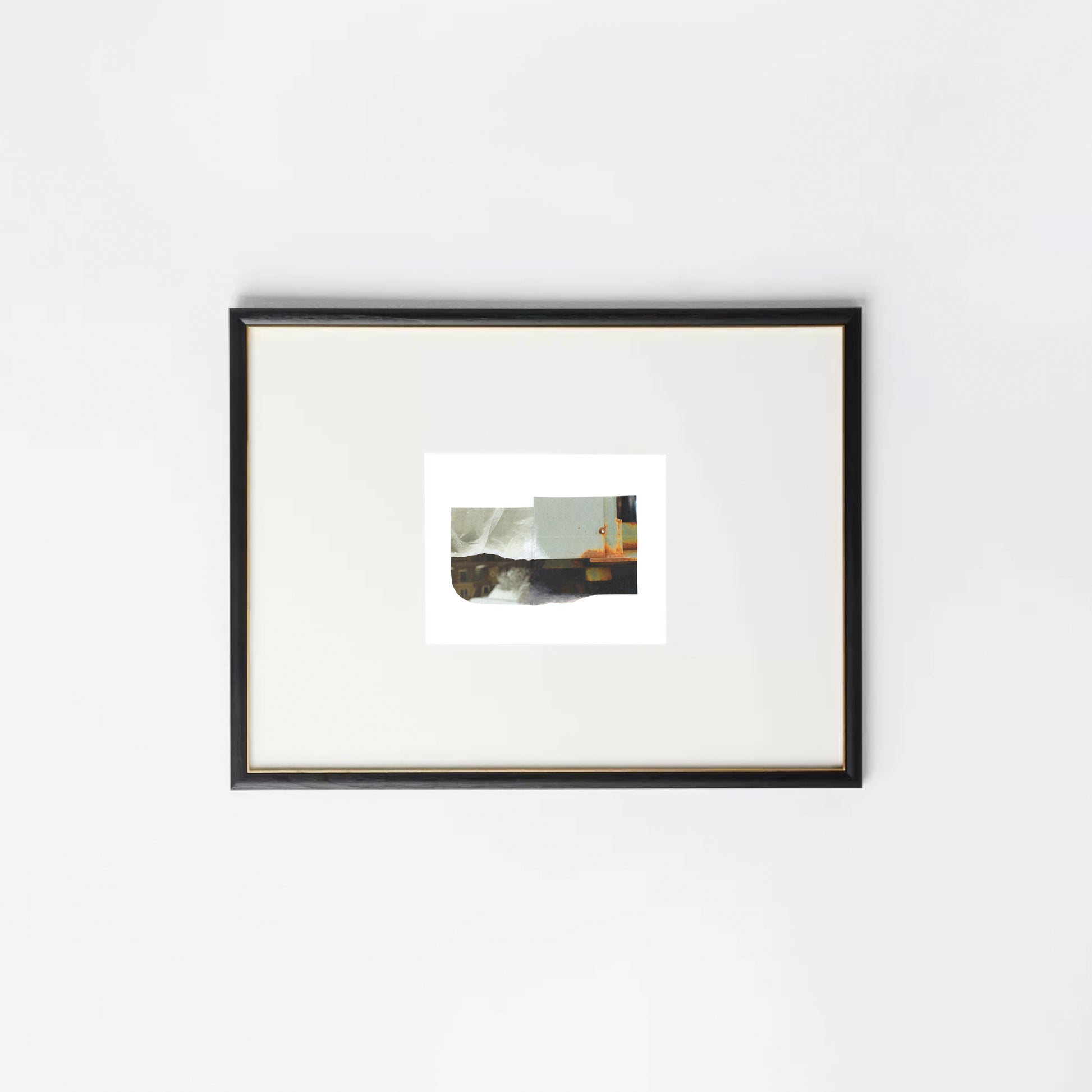 Abstract photo collage with layered architectural fragments in soft sage green, muted gray, and warm rust tones  in a black frame.
