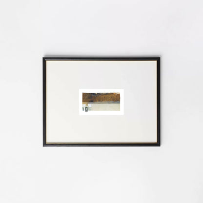 Abstract photo collage featuring golden grasses and architectural fragments in a black frame.