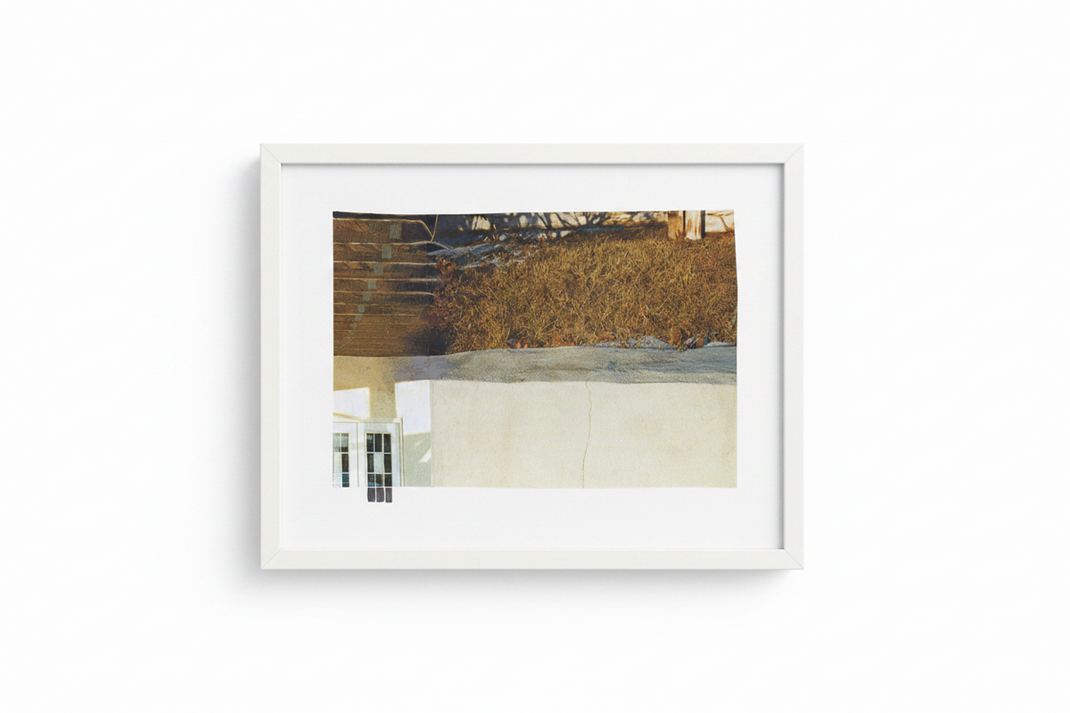 A framed art print featuring an abstract architectural scene with warm brown and beige tones, presented in a white frame against a clean white background.