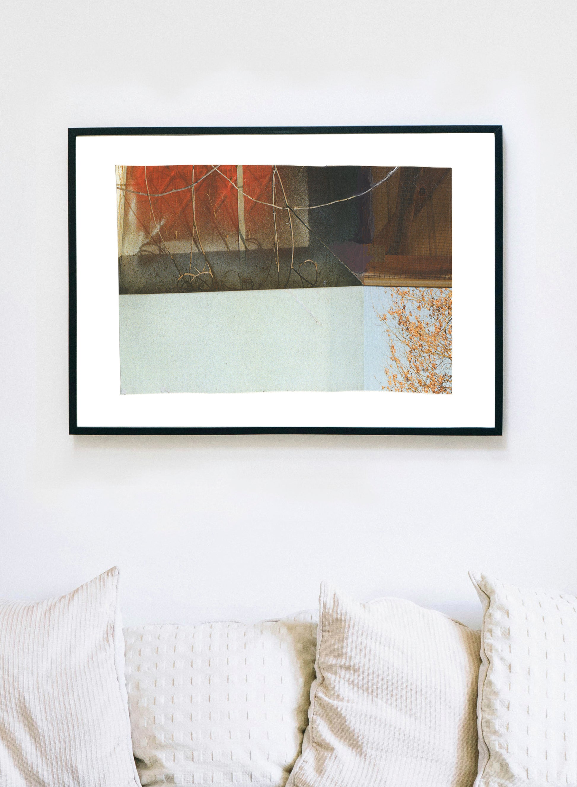 Photo collage with warm and cool tones in a black frame.