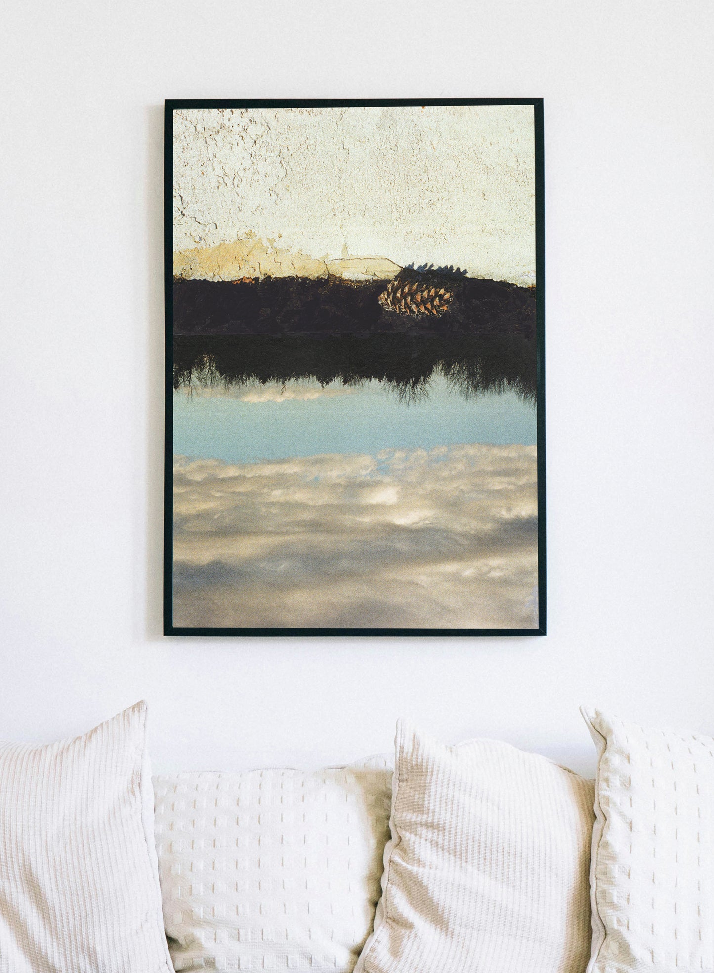 Framed canvas print of abstract collage with a landscape of stucco, trees, and sky with a pine cone.