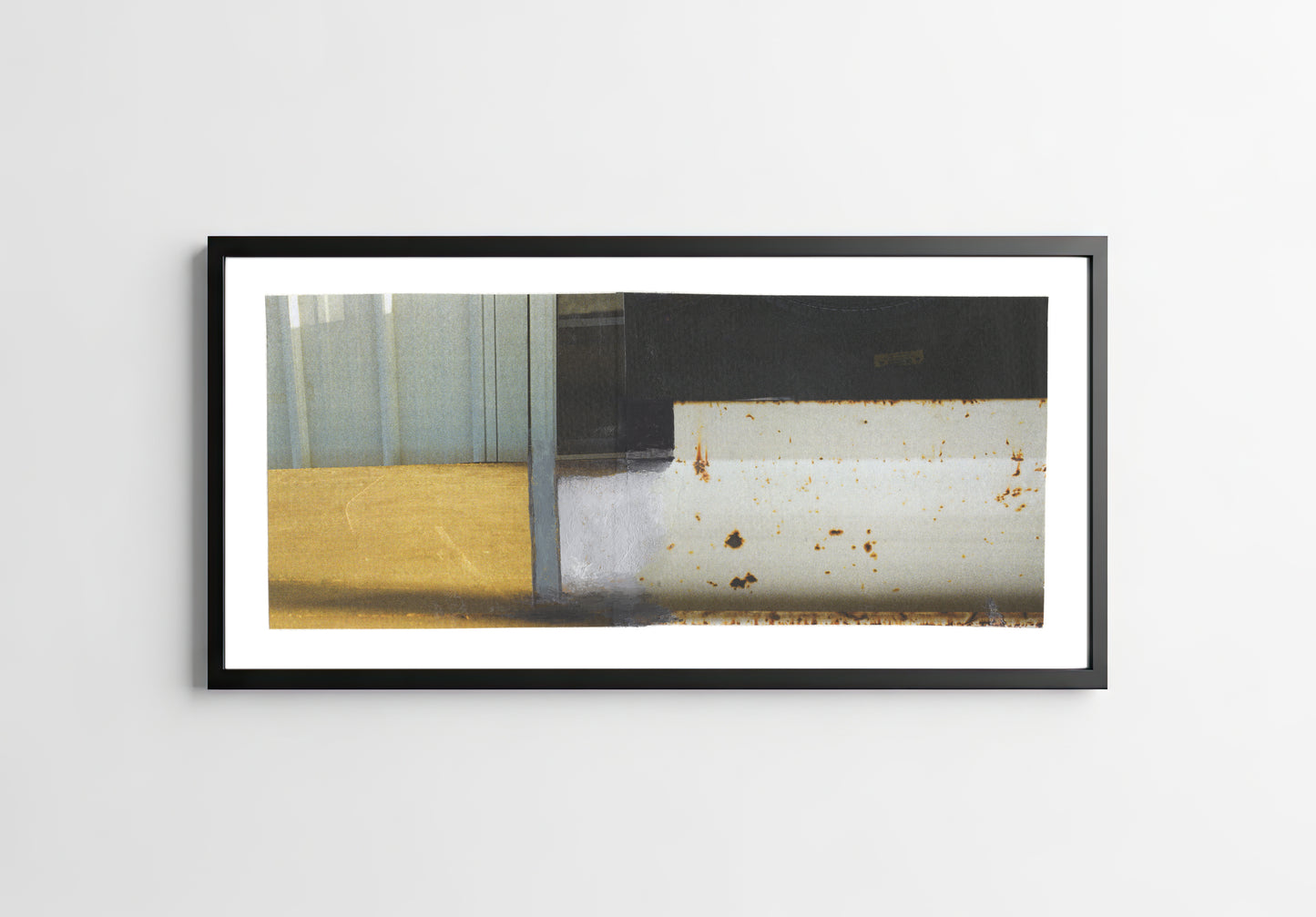 Framed abstract art collage with yellow, black, gray, and green.