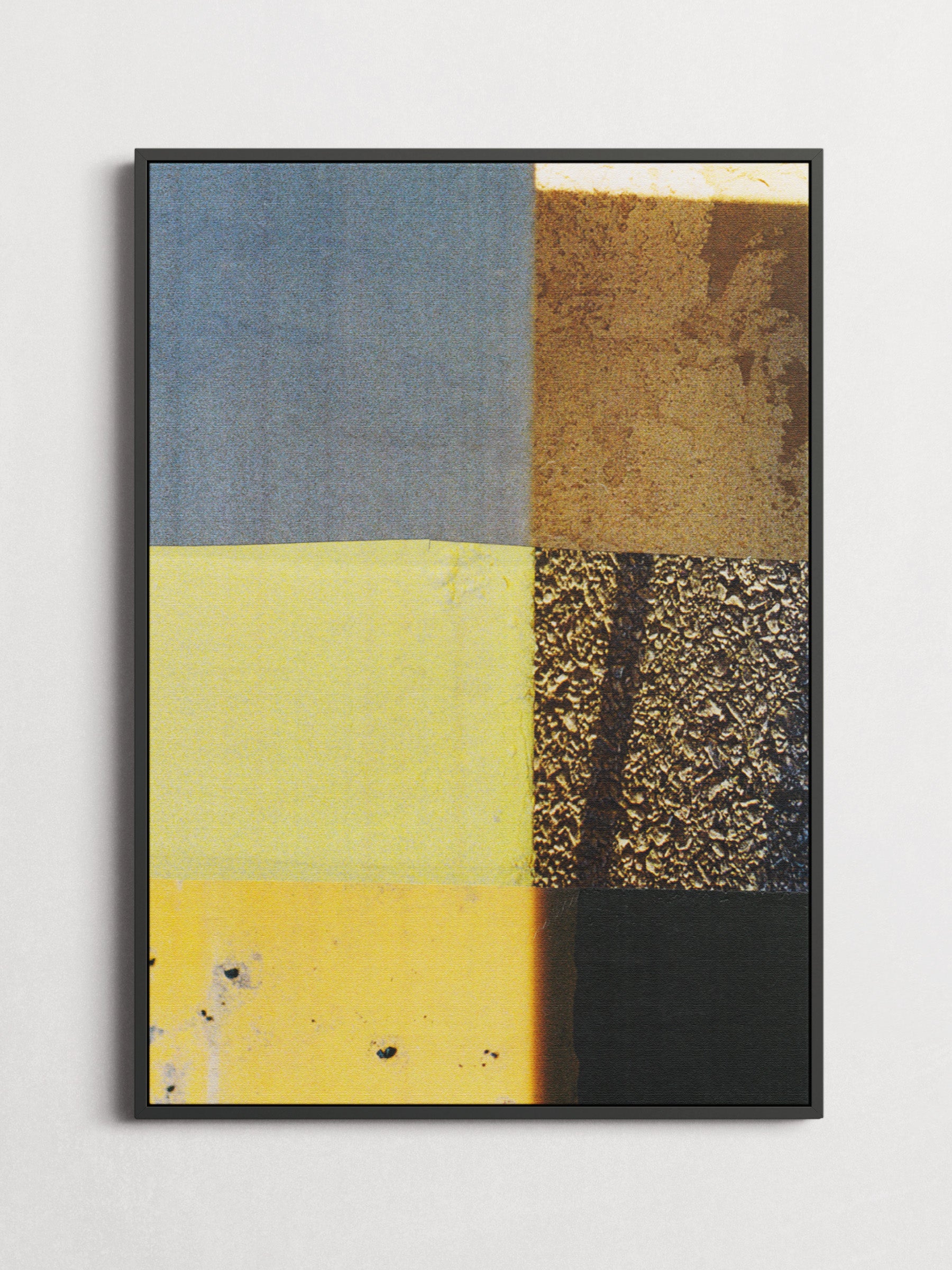 Geometric abstract photo collage with blue, yellow, green, and neutral tones in a black floater frame.
