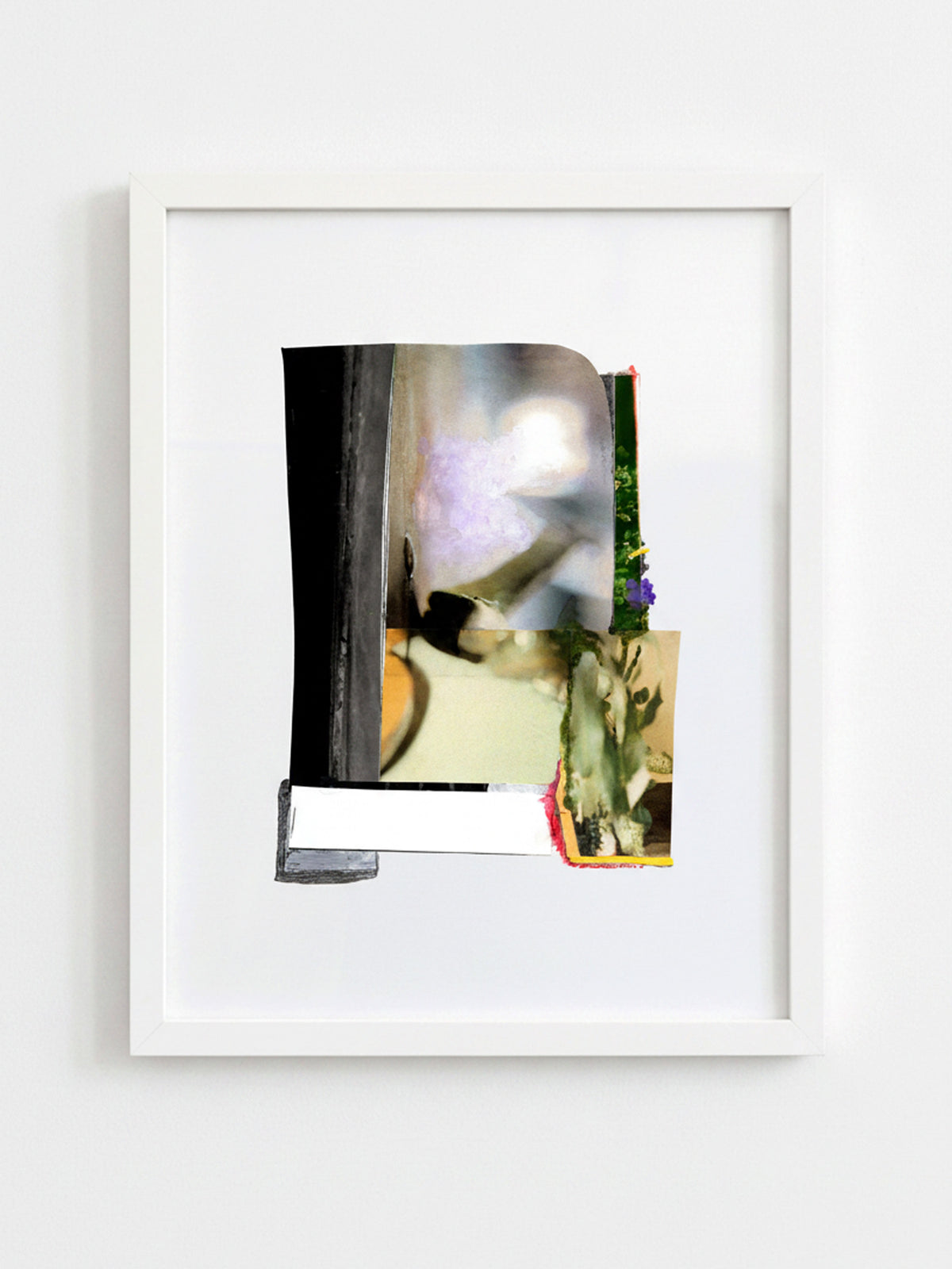 A framed abstract collage art print featuring mixed photographic elements, displayed on a clean white wall.