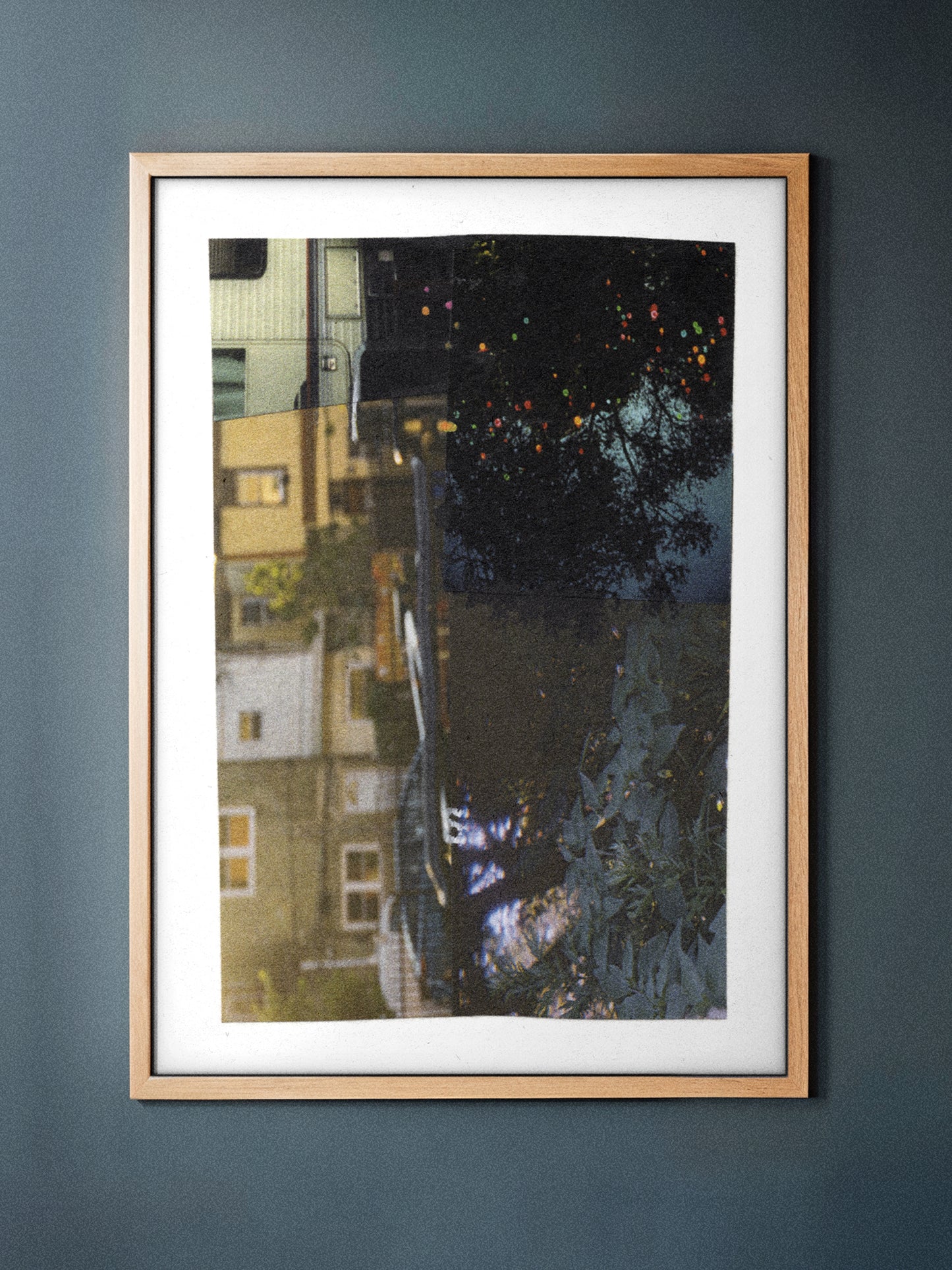Framed moody night photography collage with blacks, golds, and dark teals.
