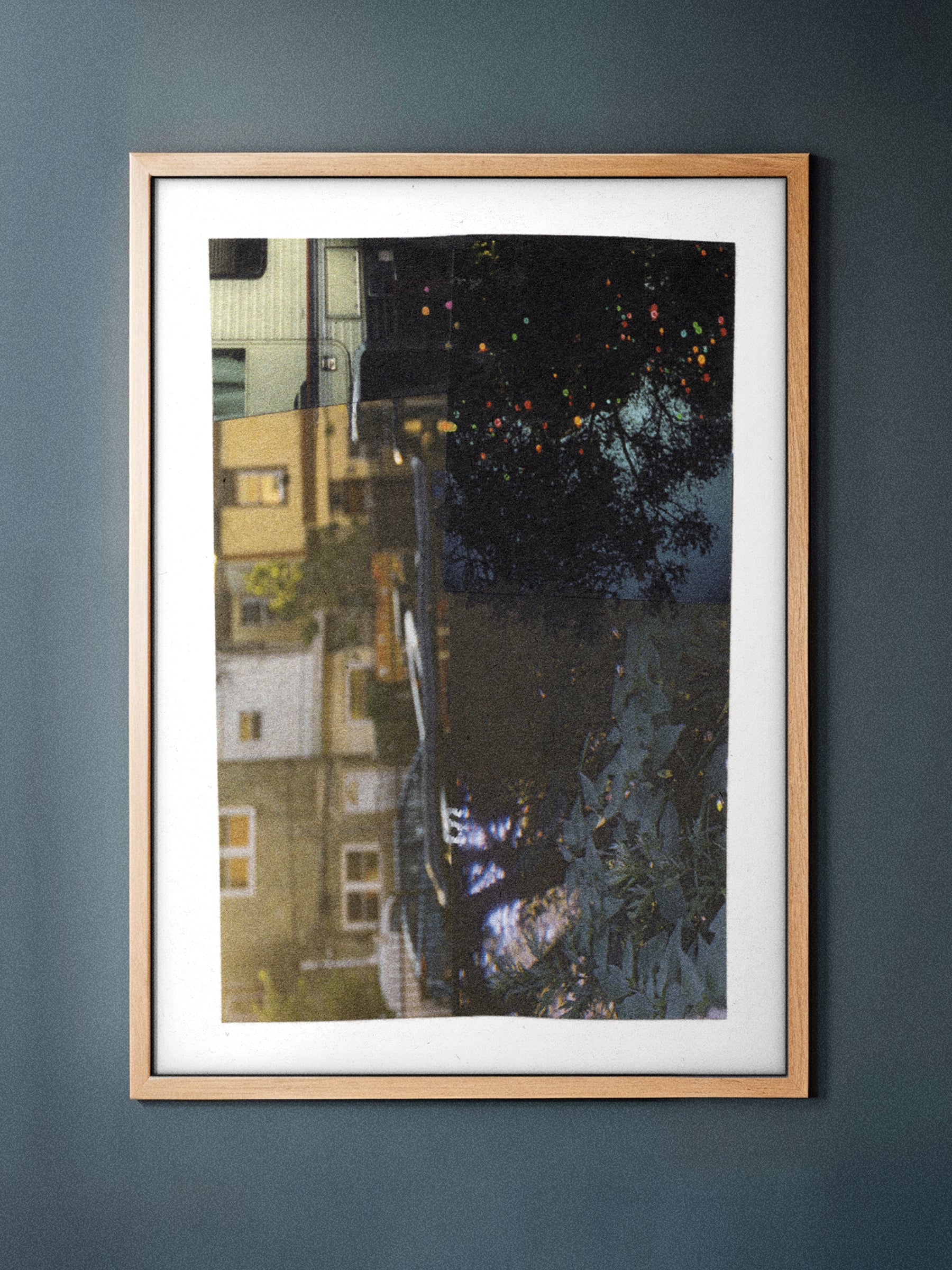 Framed moody night photography collage with blacks, golds, and dark teals.