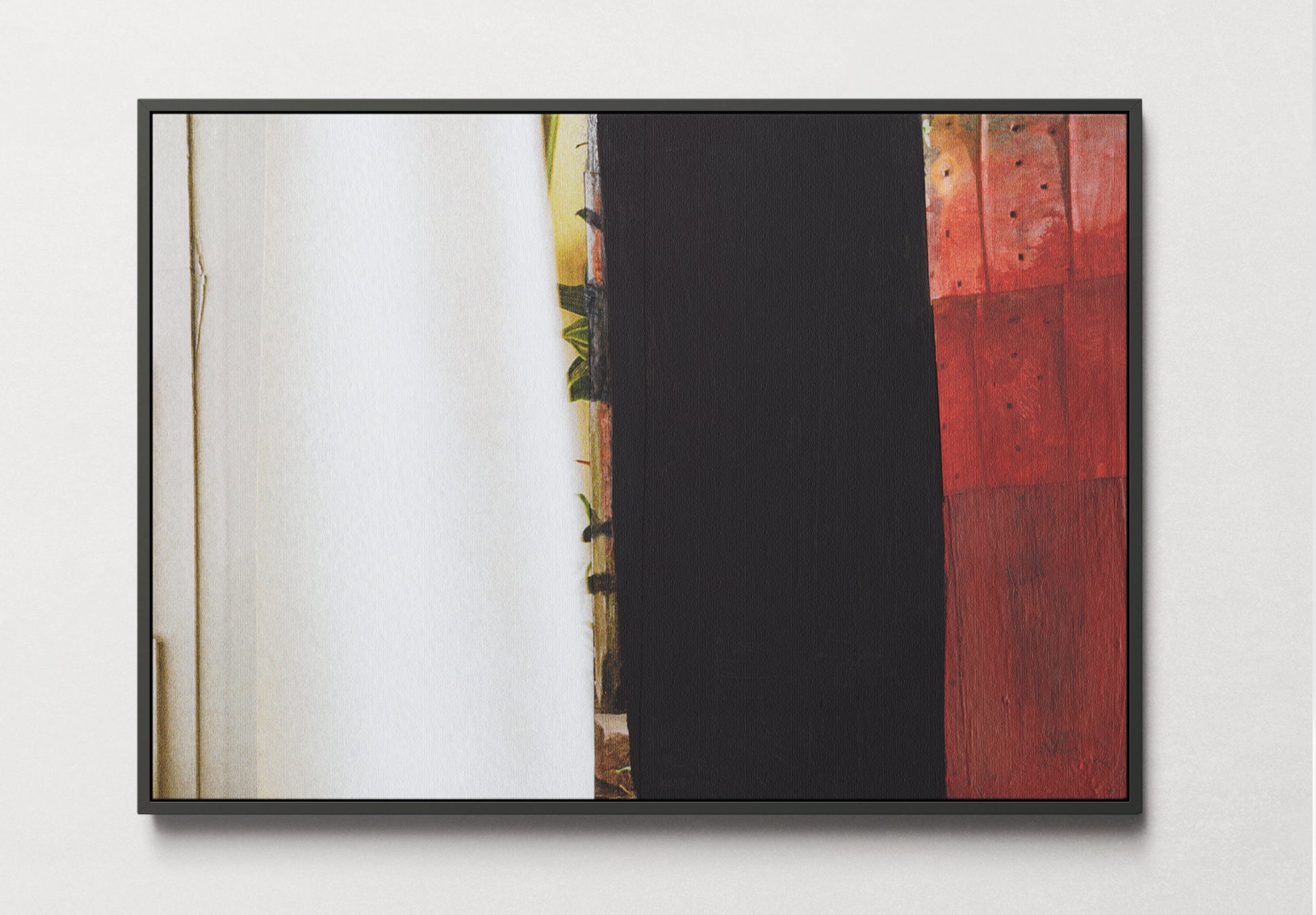 Framed canvas print of red, white, and black abstract mixed media collage art with textures.
