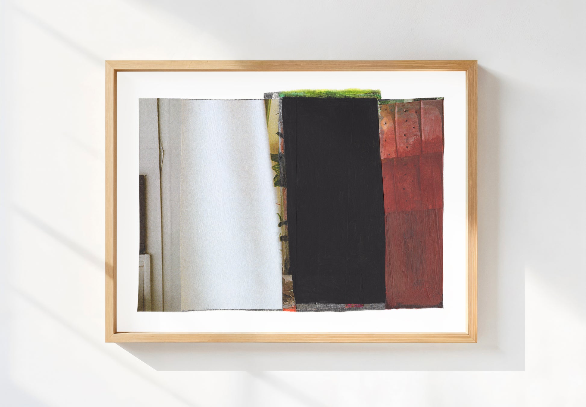 Framed print of red, white, and black abstract mixed media collage art with textures.