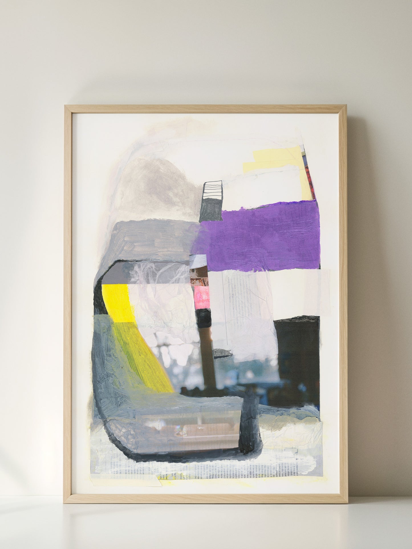 Interlude original abstract mixed media art by Libby Saylor in natural wood frame leaning against white wall