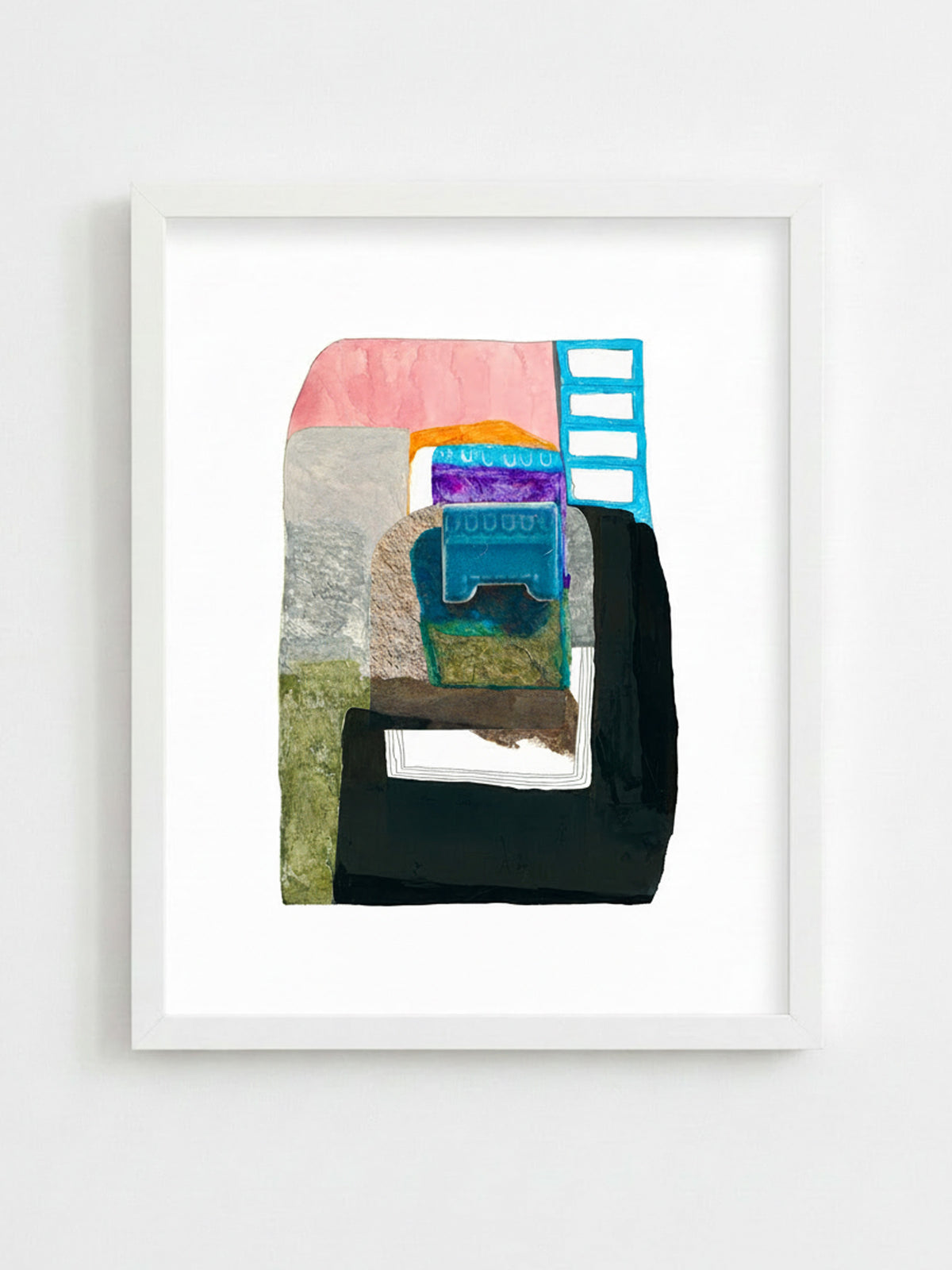 A framed abstract art print featuring a colorful geometric composition with pink, blue, green, black, and brown shapes, presented in a white frame against a light gray wall.