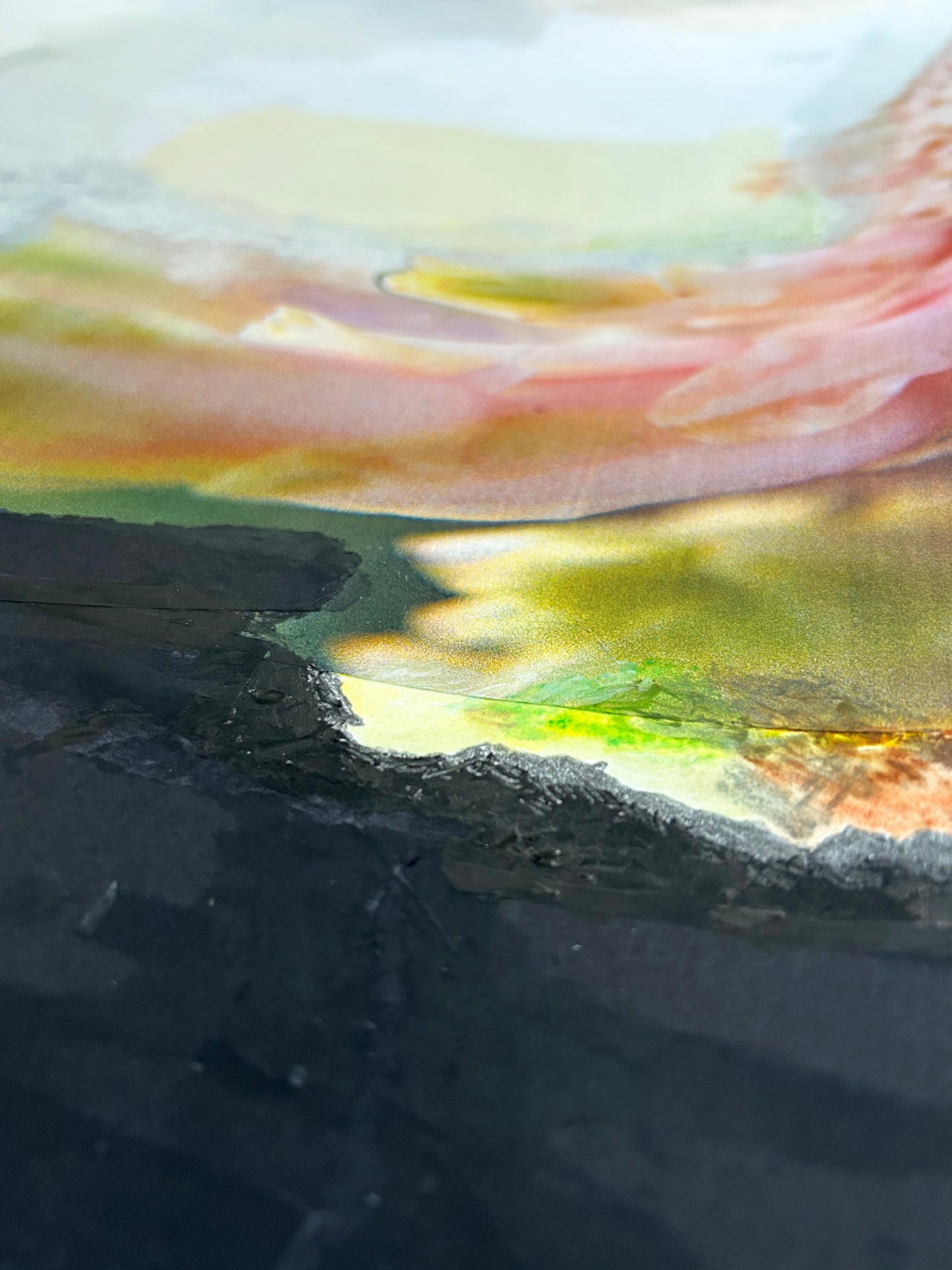 Close-up of a textured surface with abstract colorful details