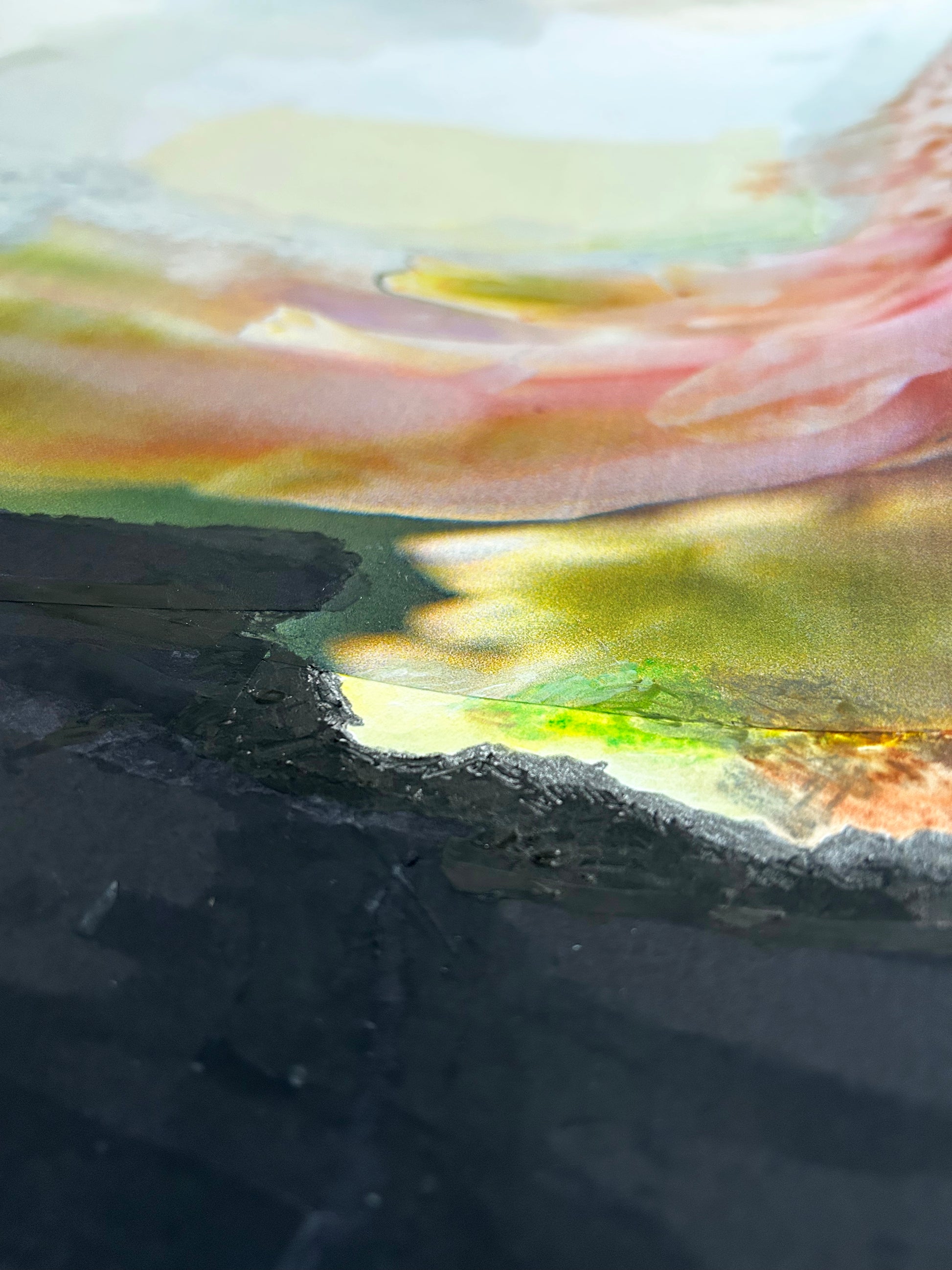 Close-up of a textured surface with abstract colorful details