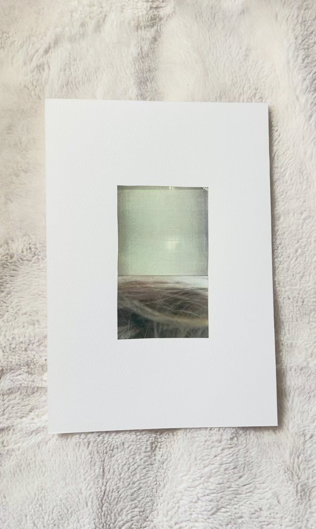 Abstract photo collage in muted greens, taupes, and golden tones on watercolor paper. 