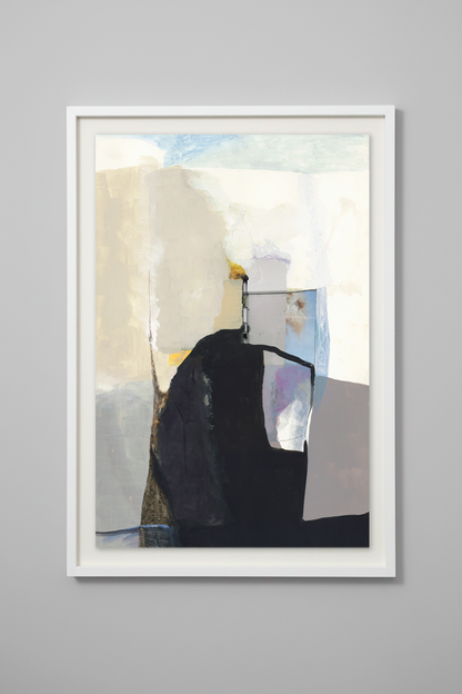 An abstract framed wall art print featuring a minimalist composition with a large black shape, cream and beige blocks, pale blue areas, and a small yellow accent, displayed against a light gray wall.