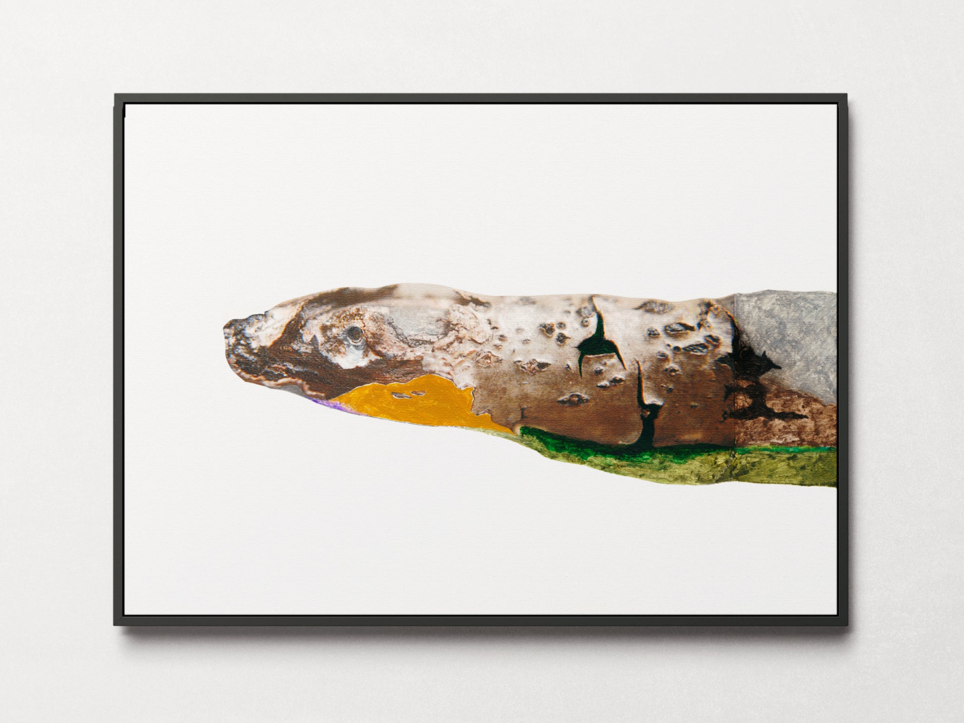 Framed art of a snake built from photo and yellow, green, and gray paint. 